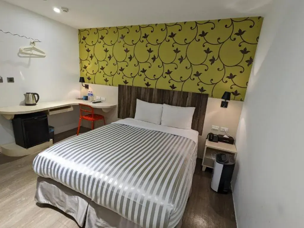 Bed in 西門大飯店 Ximen Hotel Bed in 西門大飯店 Ximen Hotel