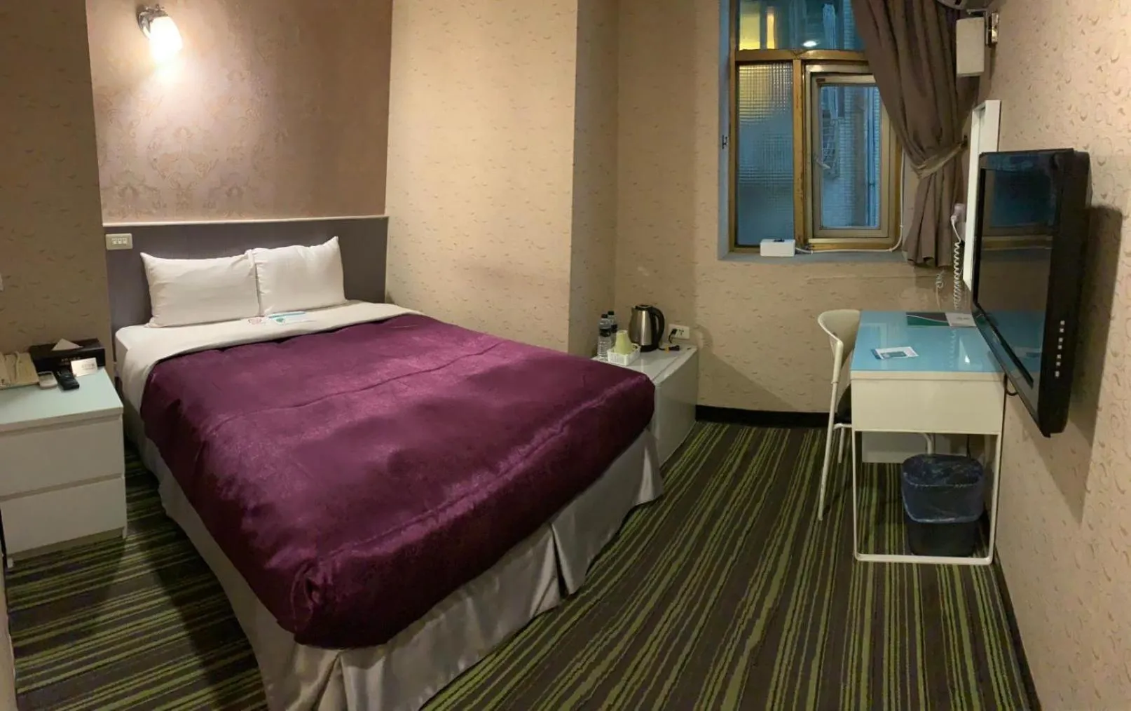 Bed in 西門大飯店 Ximen Hotel