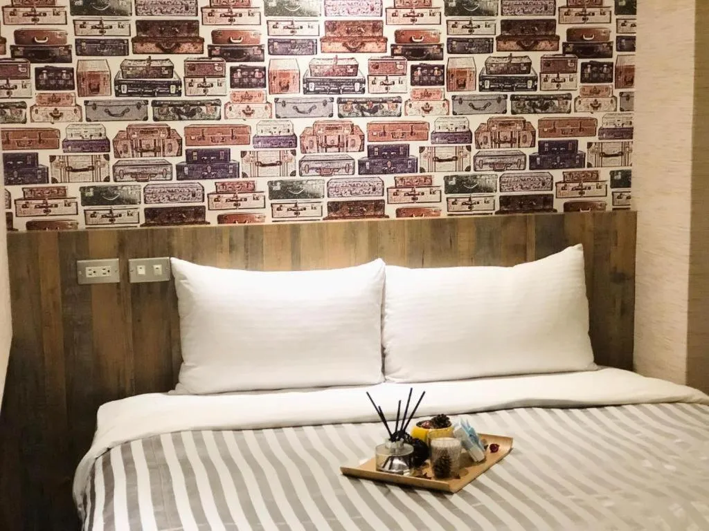 Bed in 西門大飯店 Ximen Hotel