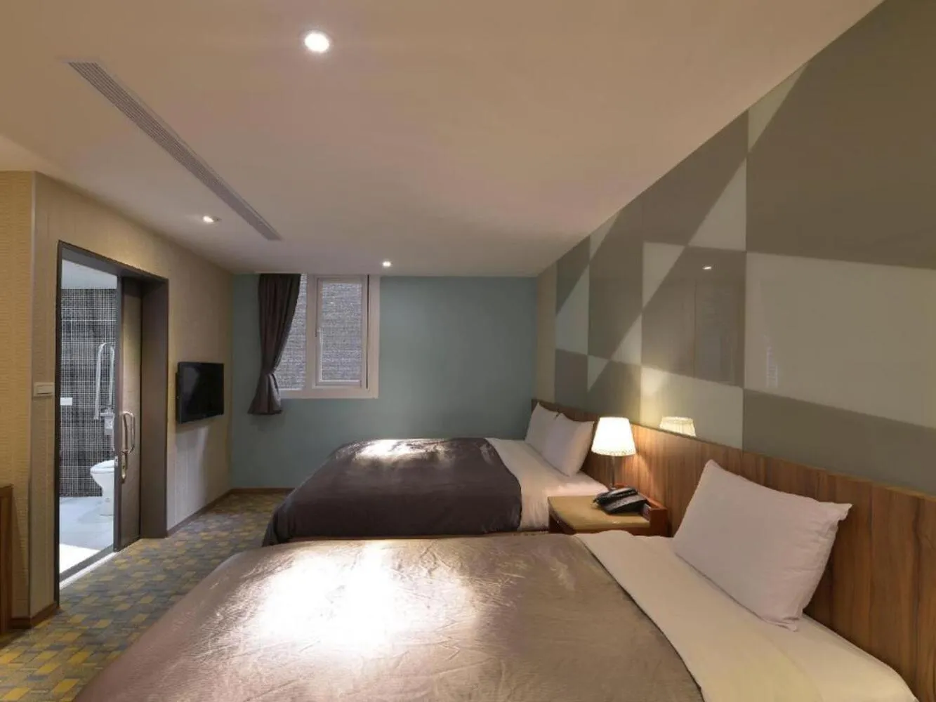 Bed in Ximen Hotel B