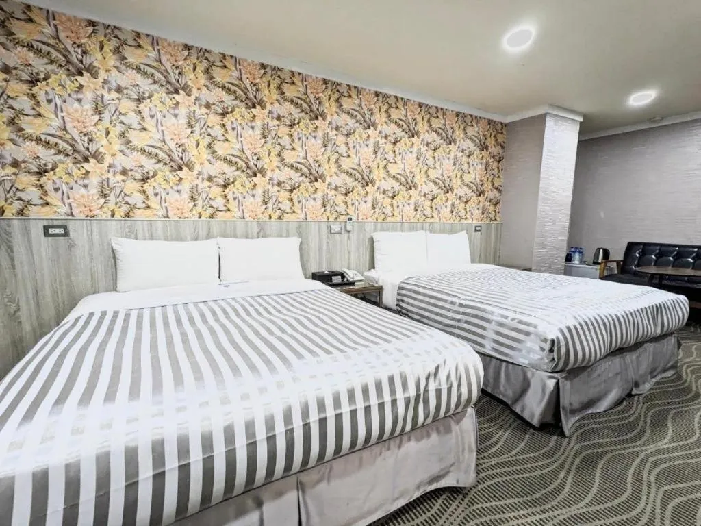 Bed in 西門大飯店 Ximen Hotel