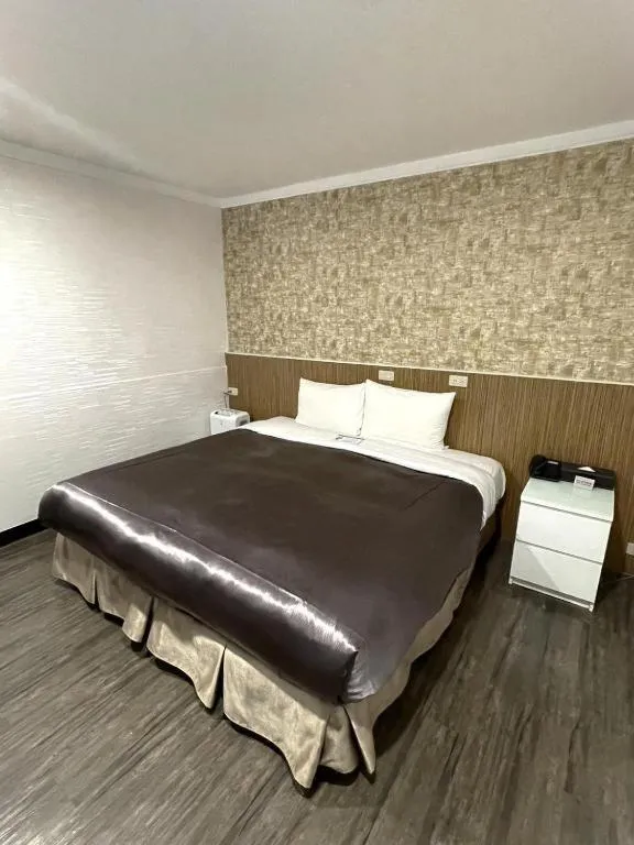 Bed in 西門大飯店 Ximen Hotel