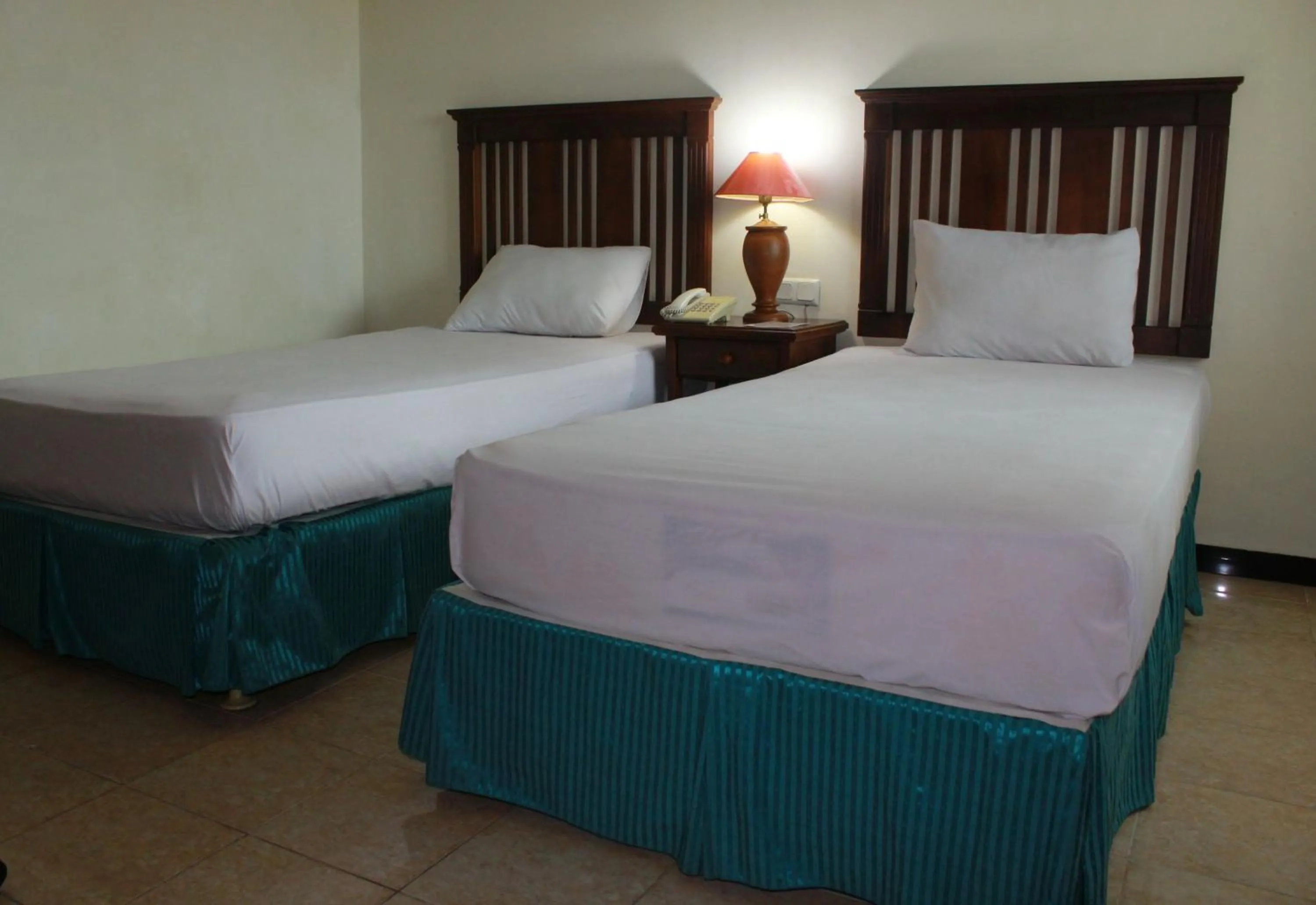 Bed in Mega Bintang Sweet Hotel