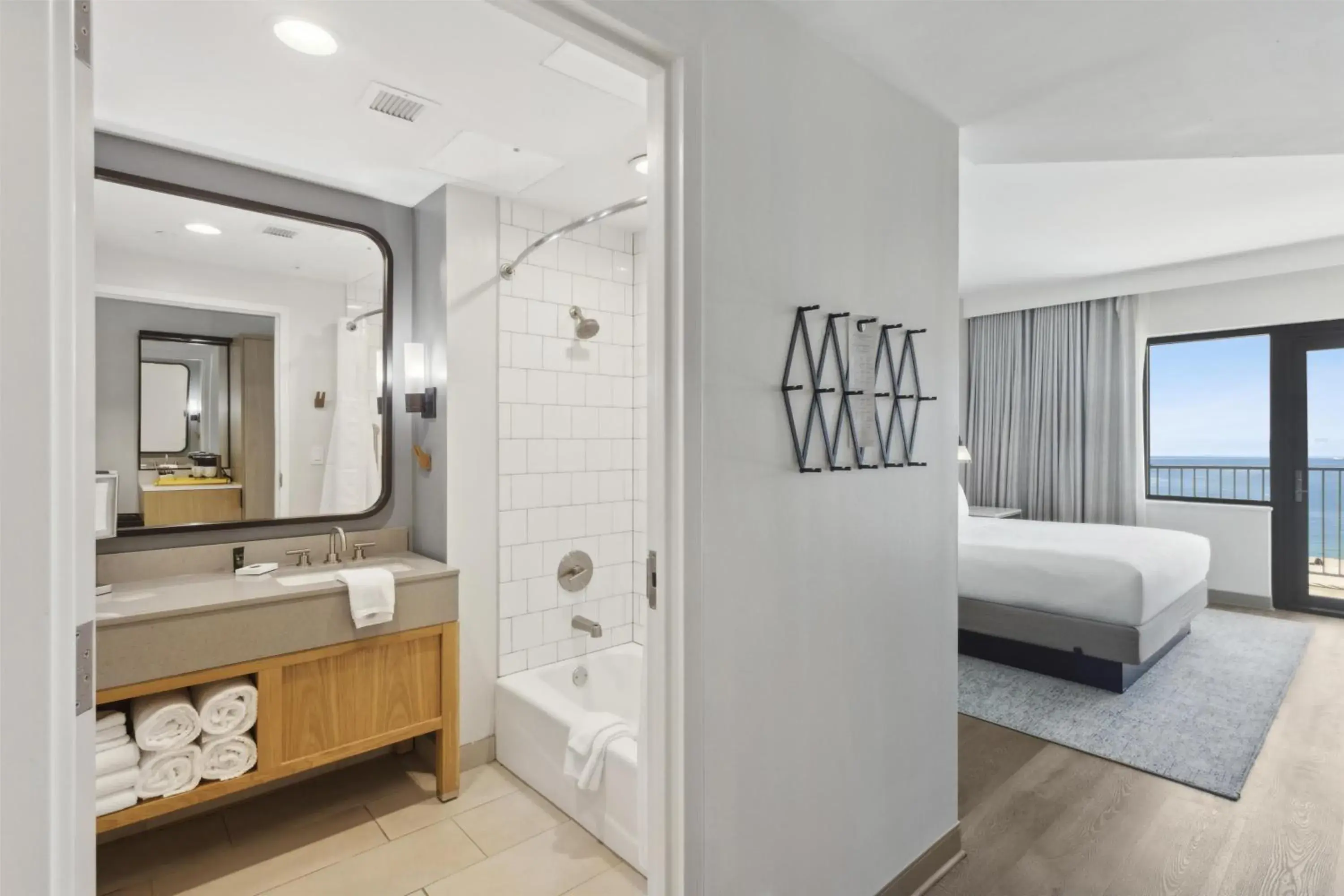 Bathroom, Bed in The Lodge at Gulf State Park, A Hilton Hotel Bathroom, Bed in The Lodge at Gulf State Park, A Hilton Hotel