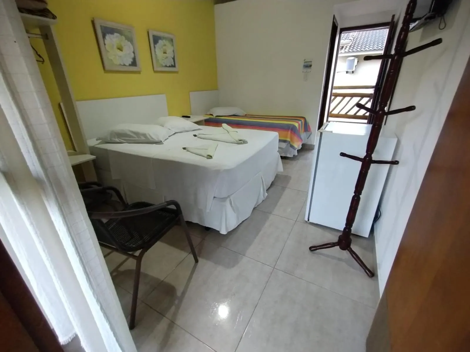 Bed in Pousada Água Marinha