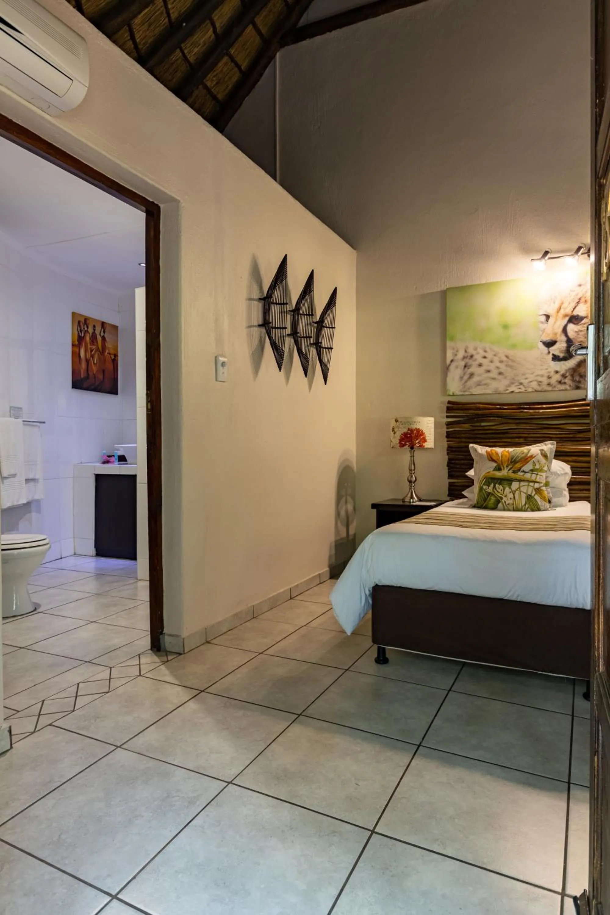 Bed in Emdoneni Lodge with Zululand Cat Conservation Project