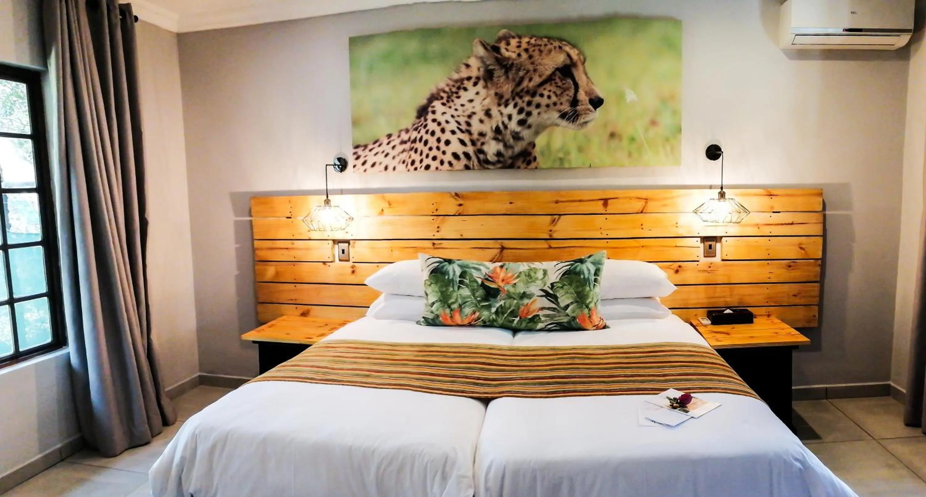 Bed in Emdoneni Lodge with Zululand Cat Conservation Project