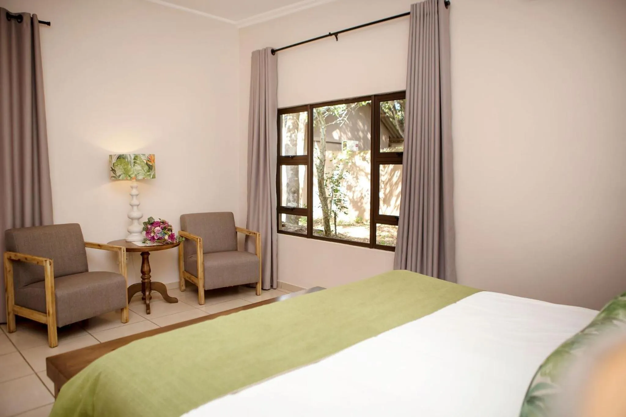 Bed in Emdoneni Lodge with Zululand Cat Conservation Project