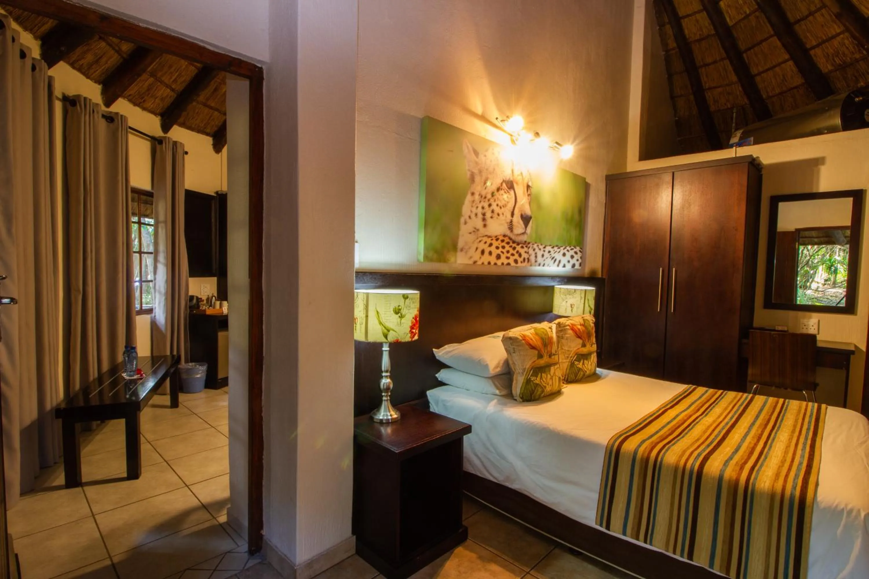 Photo of the whole room, Bed in Emdoneni Lodge with Zululand Cat Conservation Project