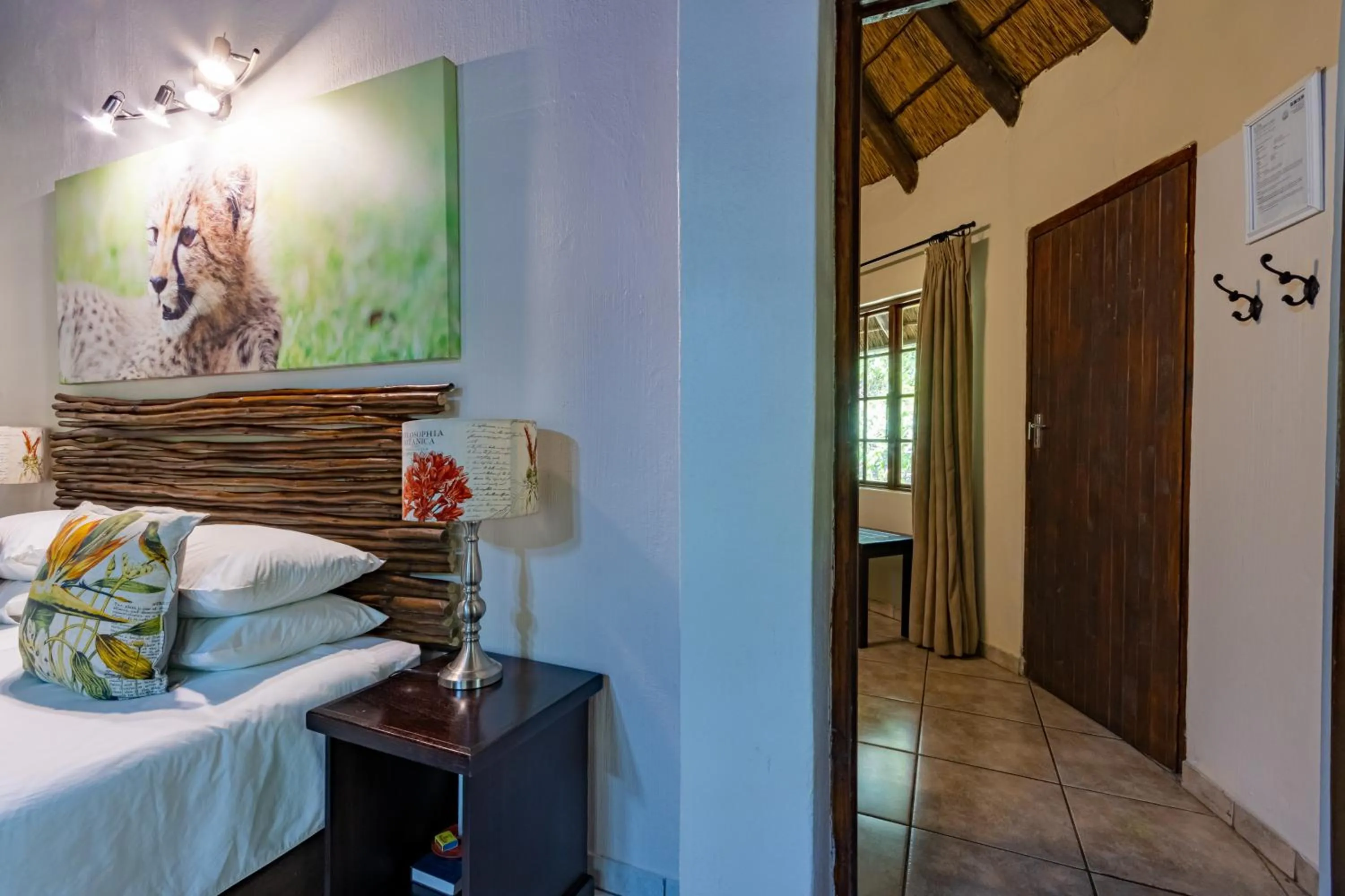 Bed in Emdoneni Lodge with Zululand Cat Conservation Project