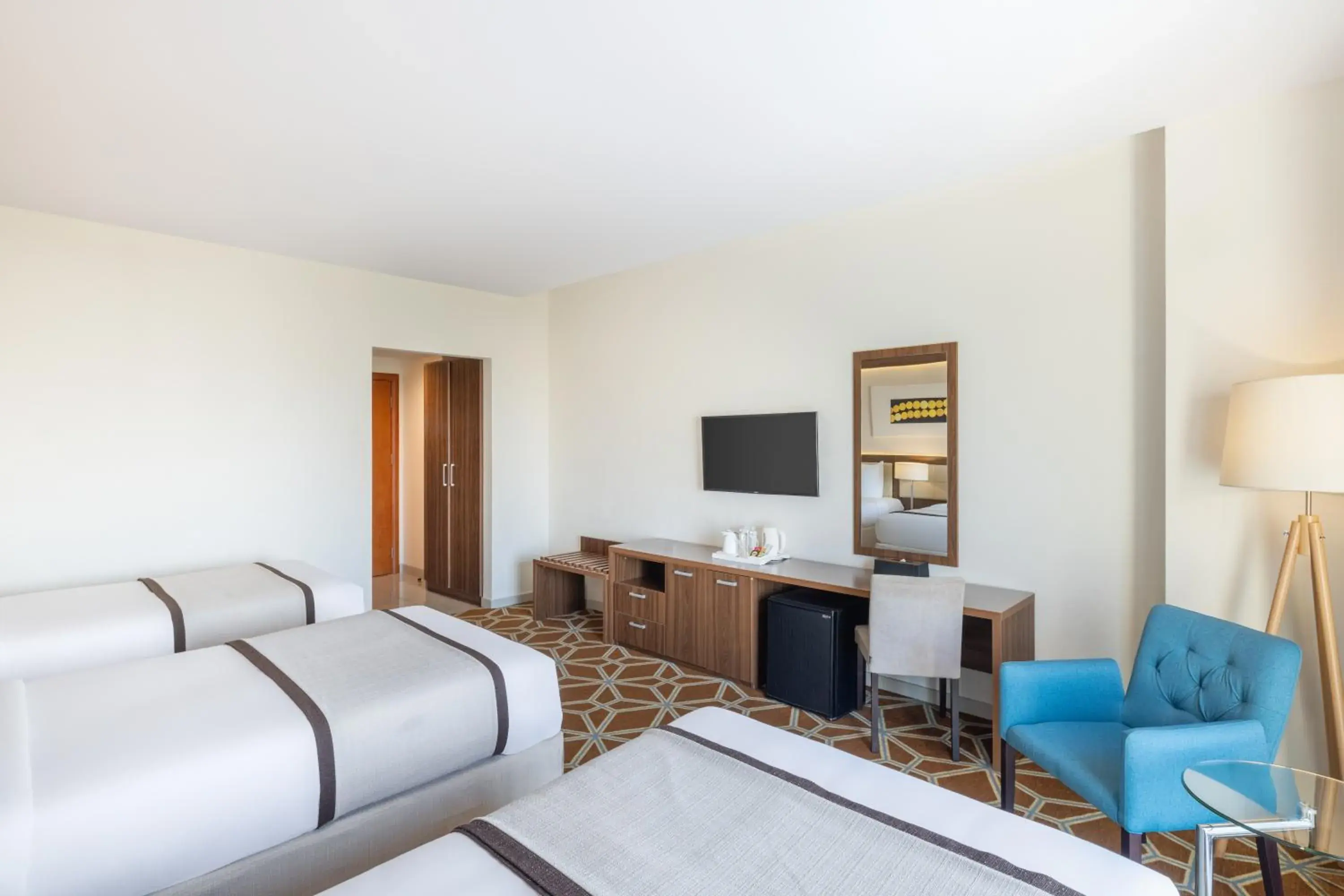 Communal lounge/ TV room, Bed in Blue Coral Hotel Communal lounge/ TV room, Bed in Blue Coral Hotel