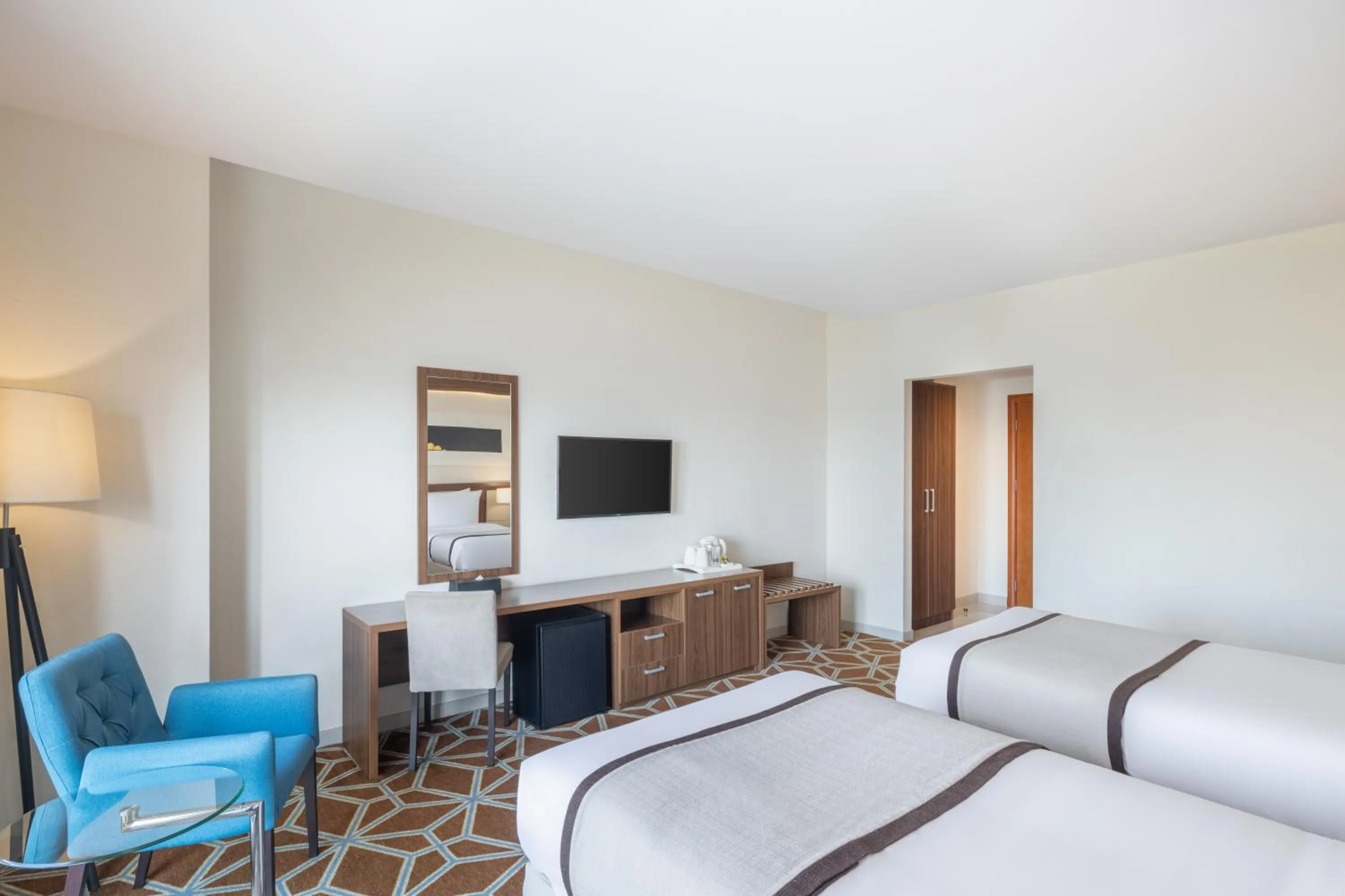 Bed in Blue Coral Hotel