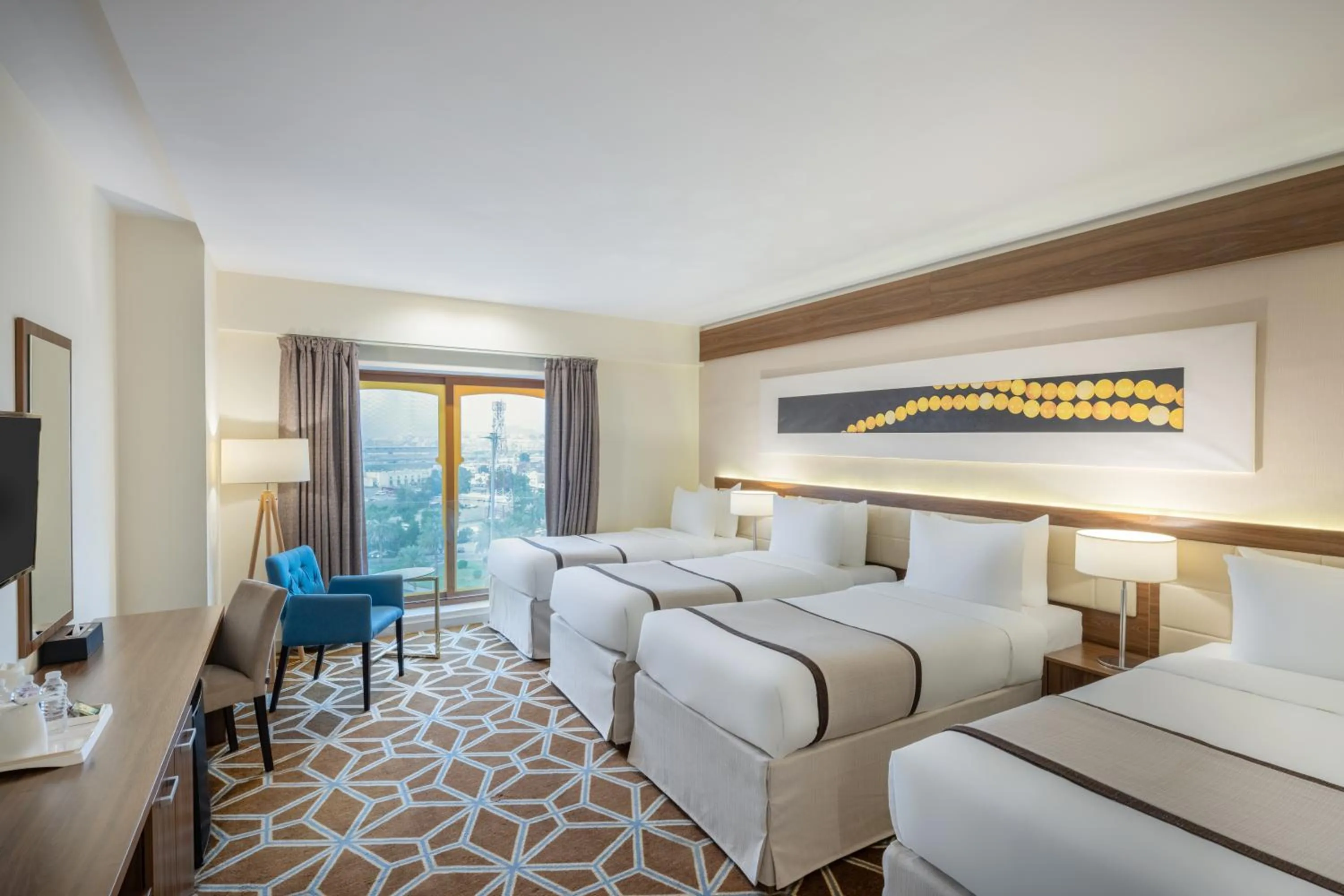 Bed in Blue Coral Hotel