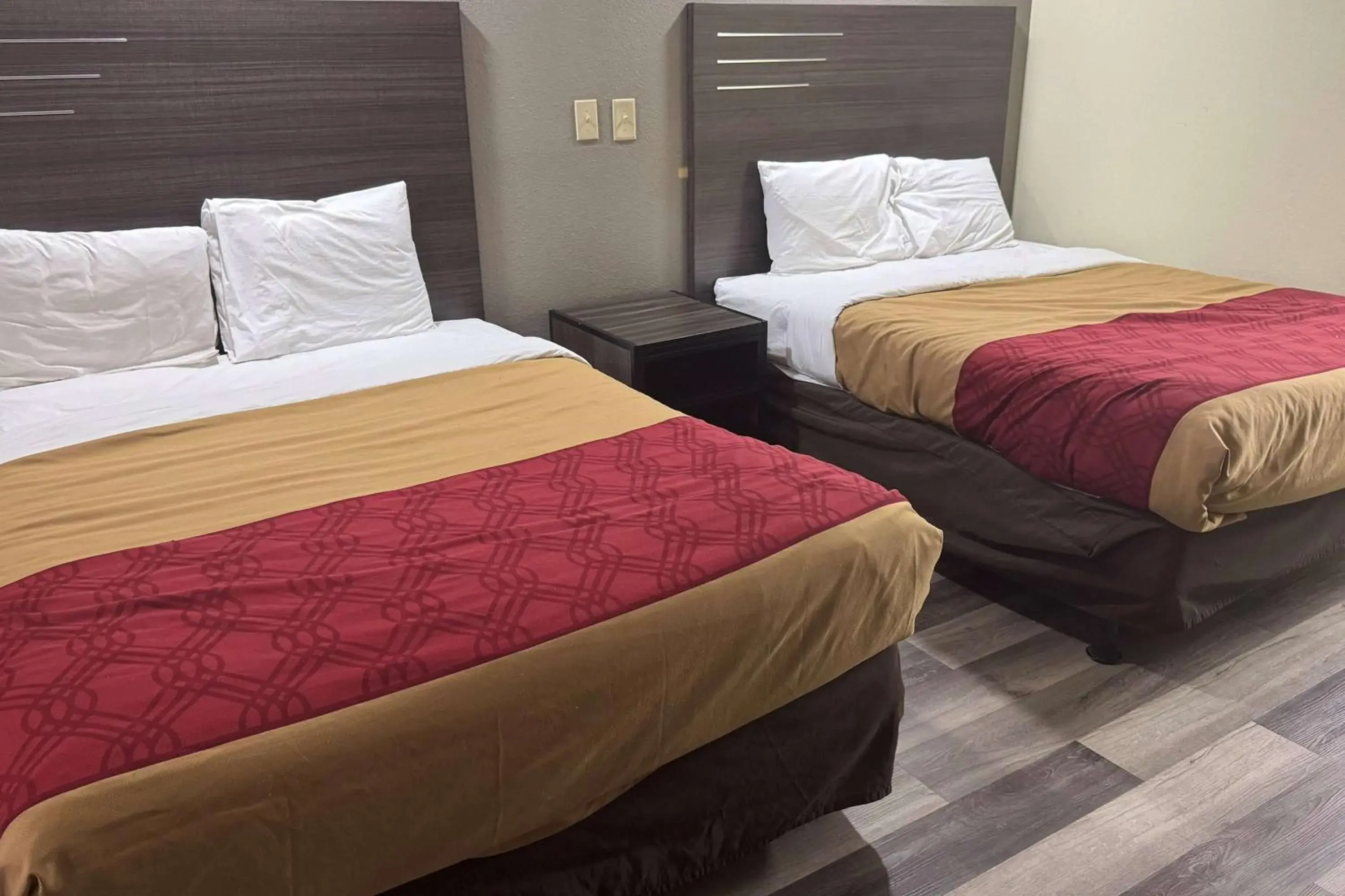 Photo of the whole room, Bed in Super 8 by Wyndham Jackson MS Near the Fairgrounds Photo of the whole room, Bed in Super 8 by Wyndham Jackson MS Near the Fairgrounds