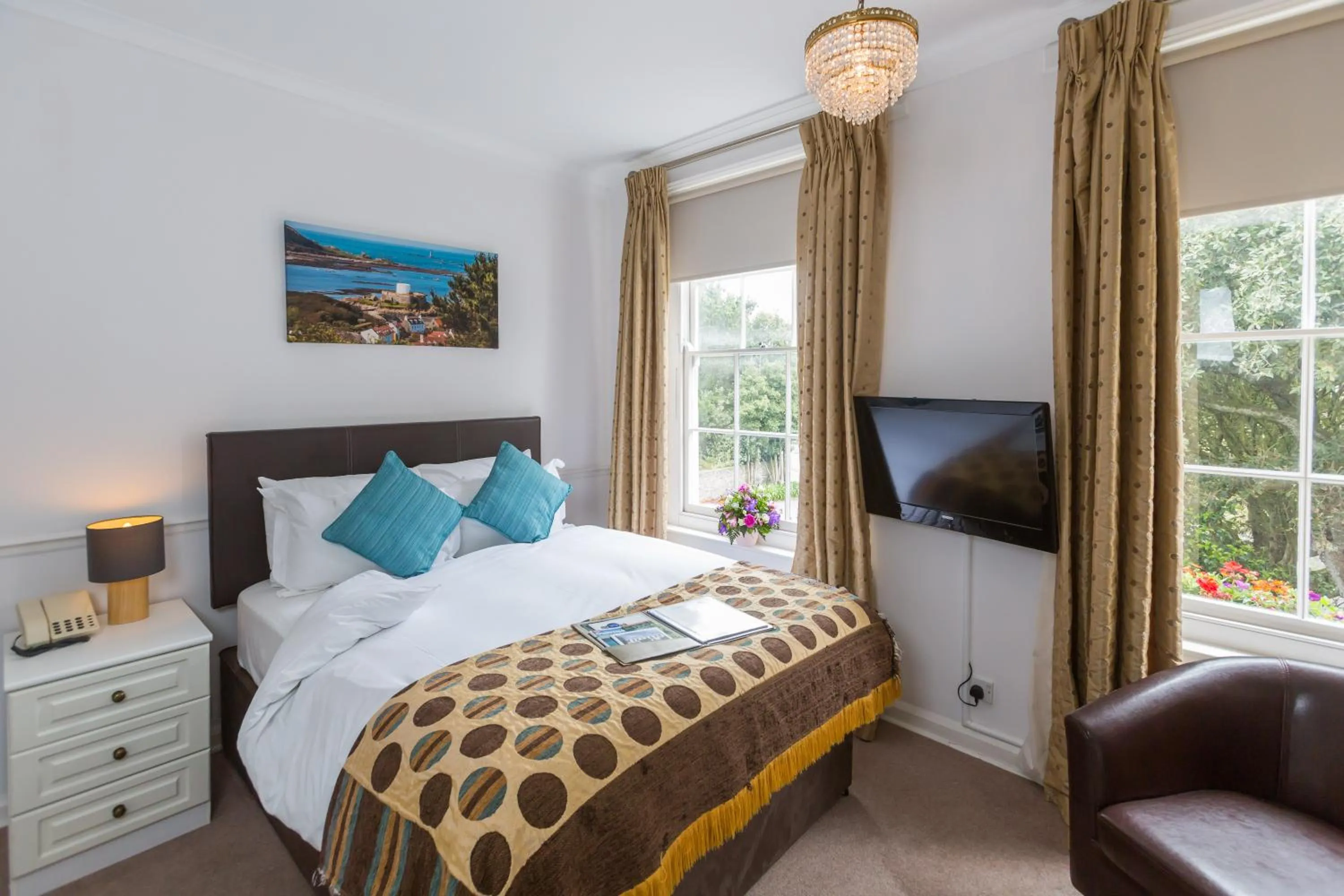 Bed in La Collinette Hotel, Cottages & Apartments