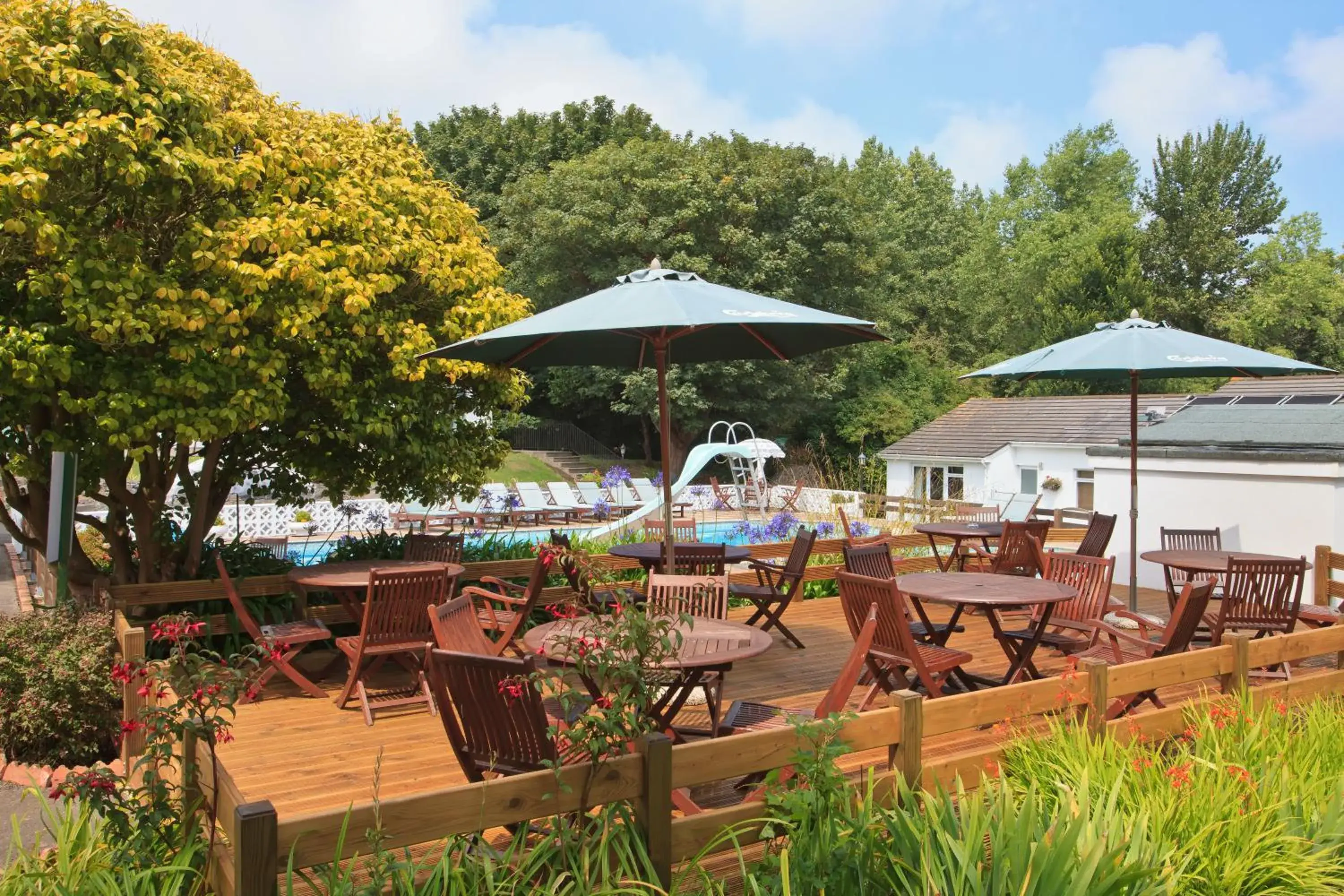 Patio in La Collinette Hotel, Cottages & Apartments Patio in La Collinette Hotel, Cottages & Apartments
