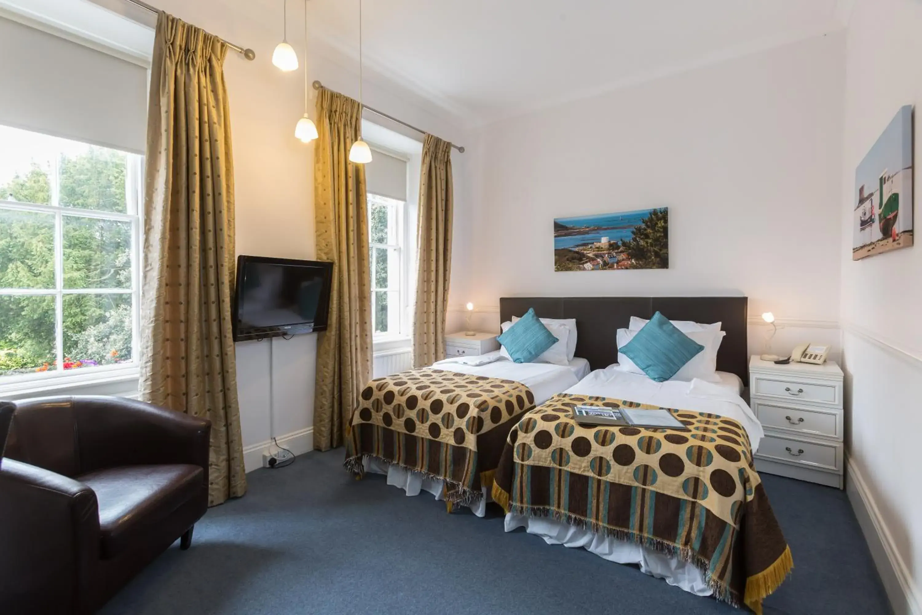 Bed in La Collinette Hotel, Cottages & Apartments Bed in La Collinette Hotel, Cottages & Apartments