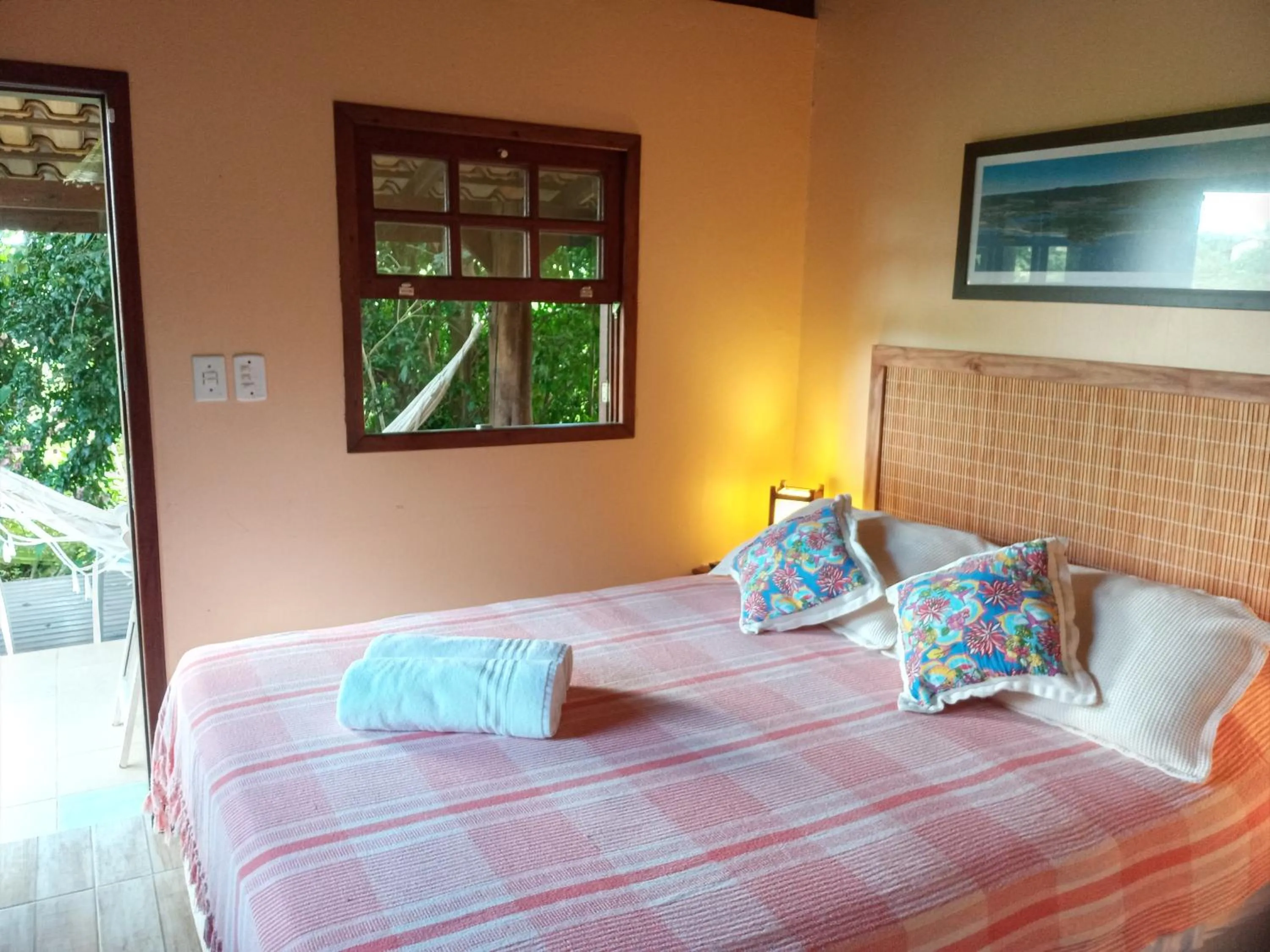 View (from property/room), Bed in Pousada Rosa & Canela