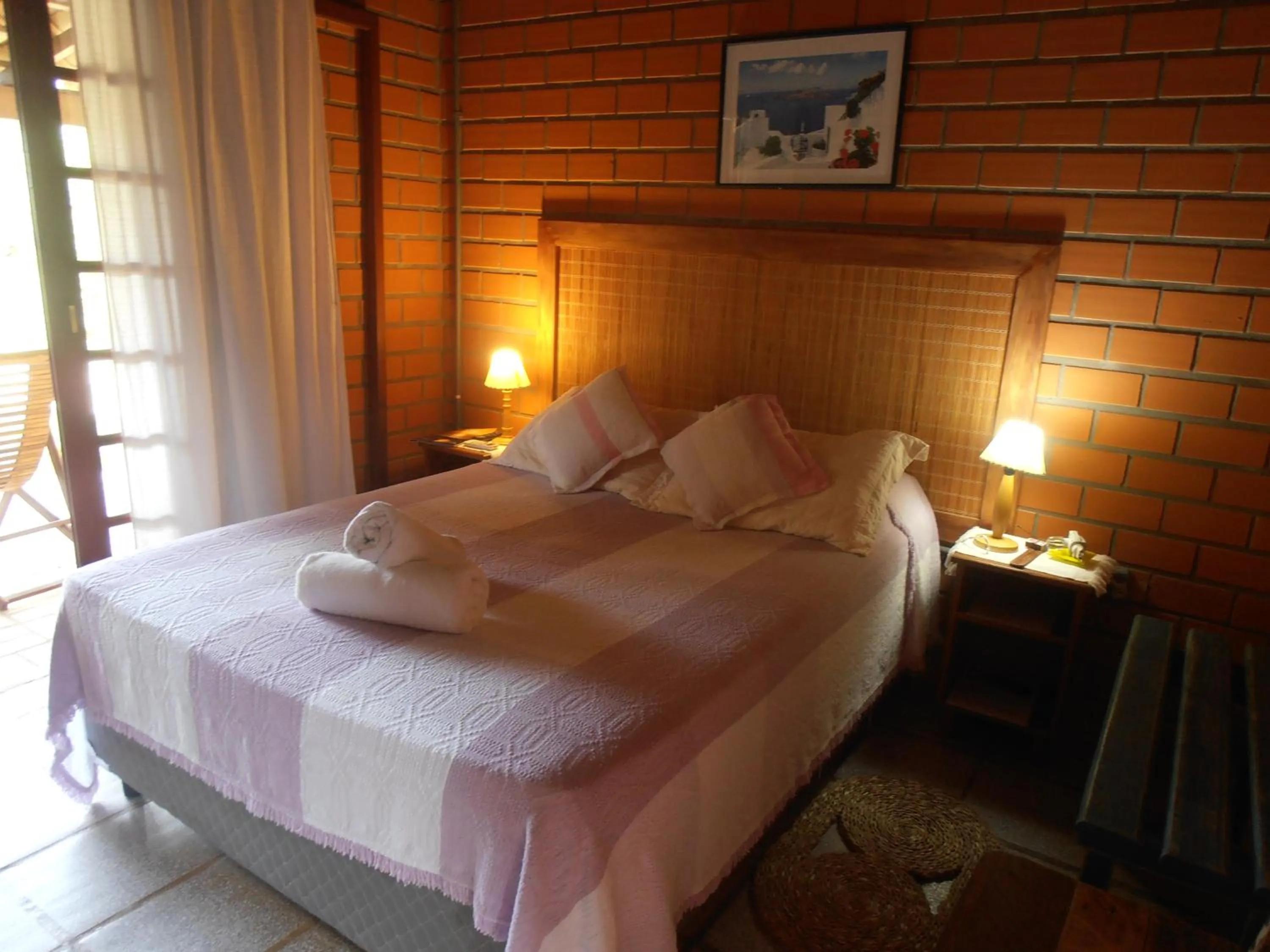 Photo of the whole room, Bed in Pousada Rosa & Canela