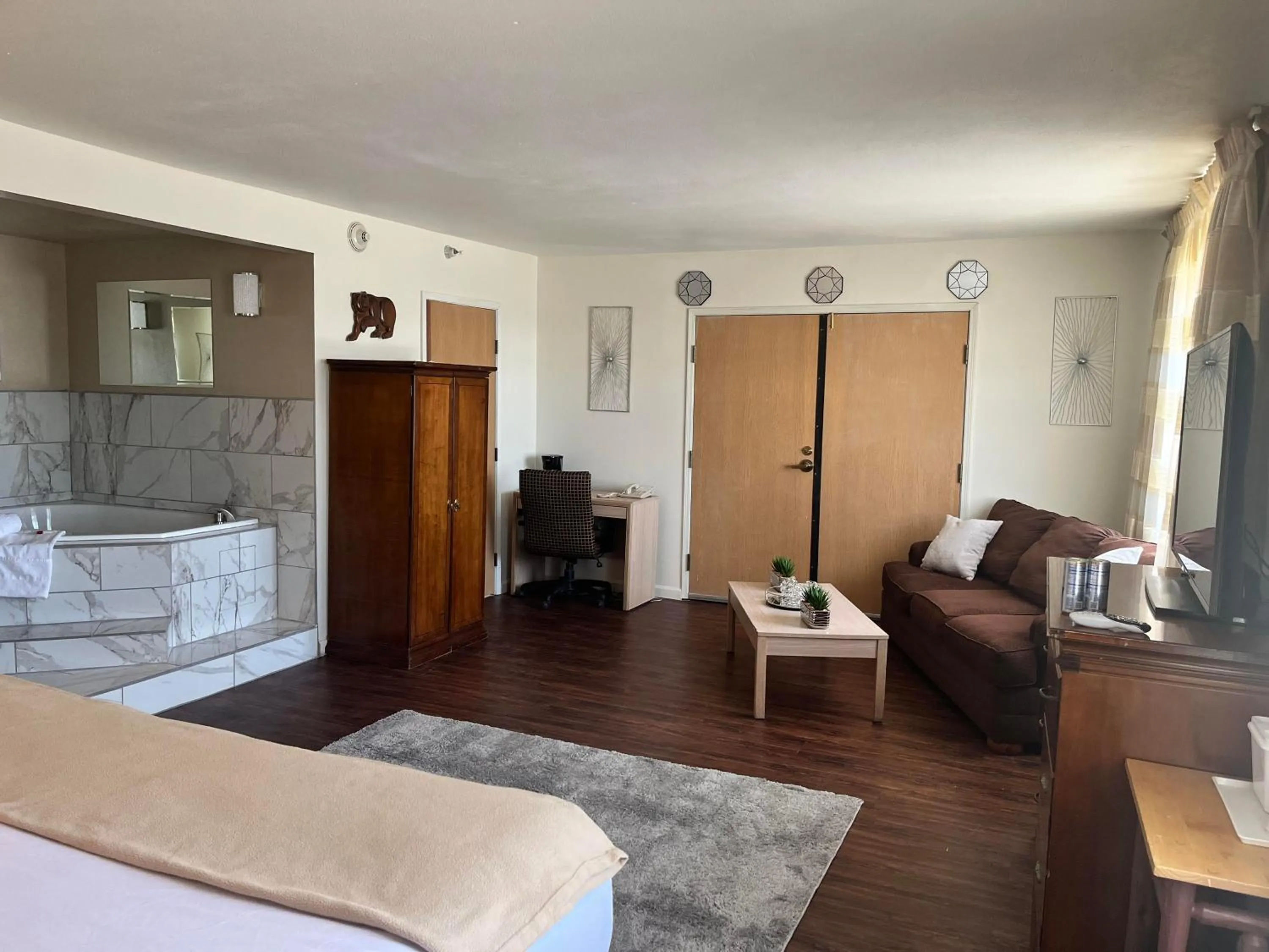 Bed in Ramada Downtown by Wyndham Anchorage