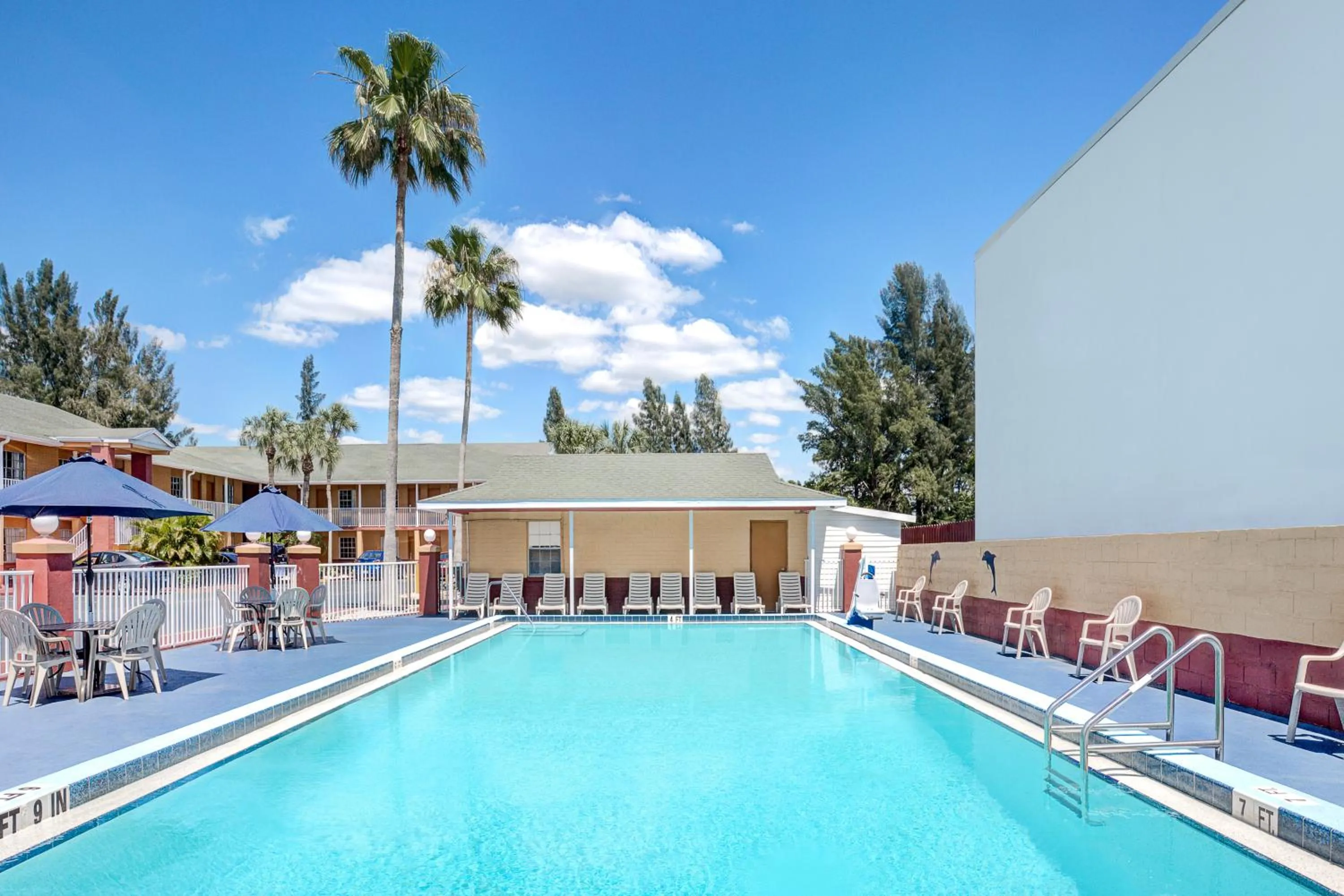 Swimming pool in Howard Johnson by Wyndham Ft. Myers FL