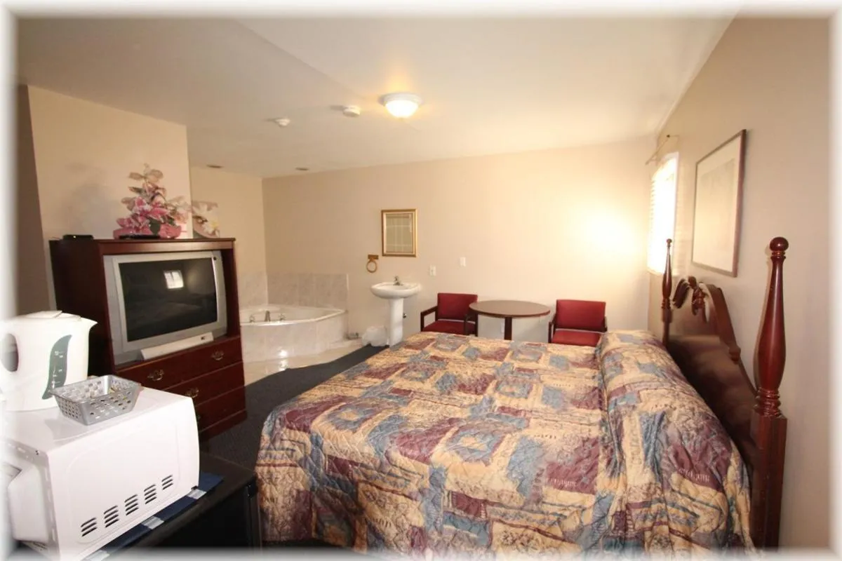 Photo of the whole room, Bed in Lotus Motel
