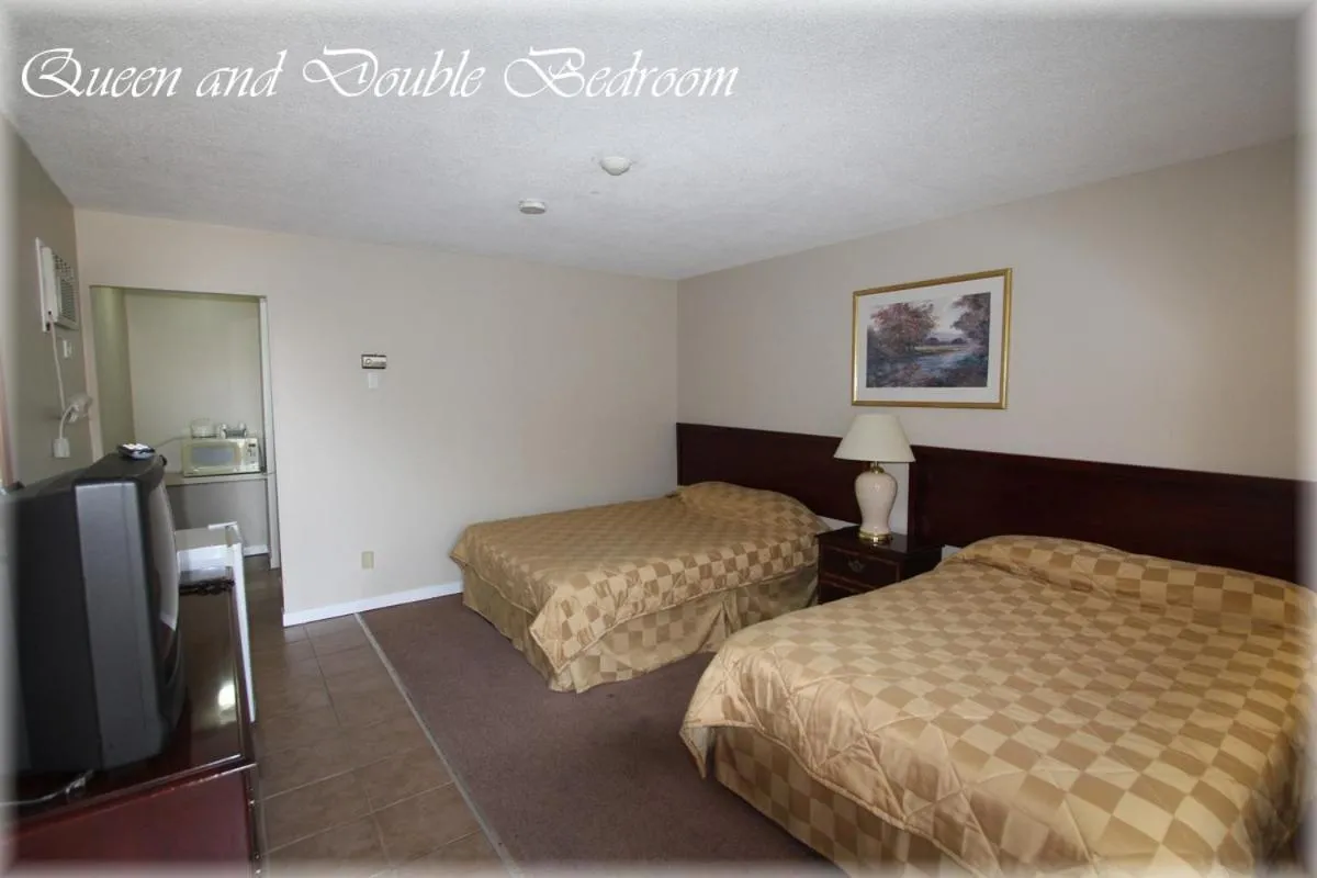 Photo of the whole room, Bed in Lotus Motel
