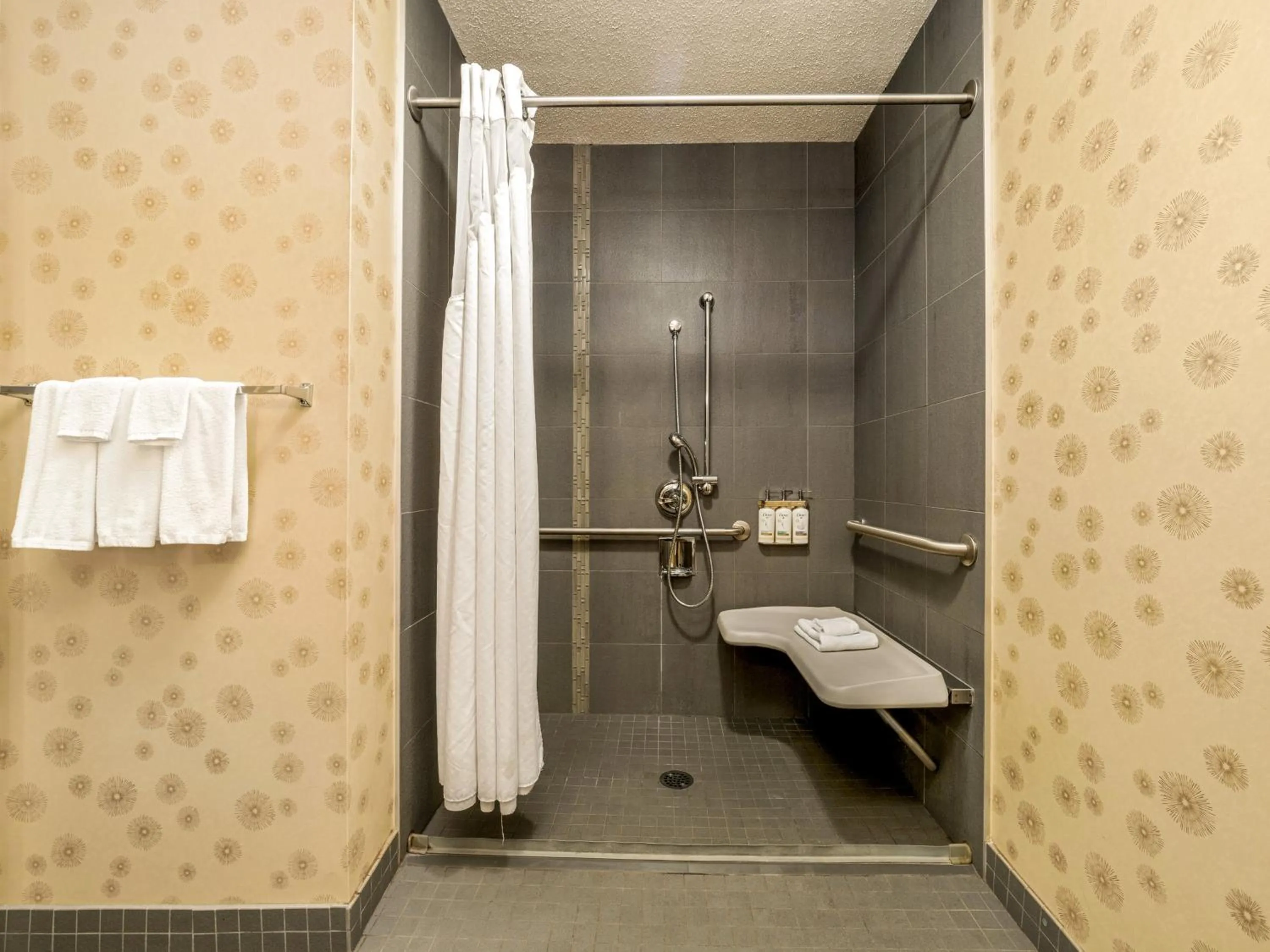 Toilet in Holiday Inn Lethbridge by IHG