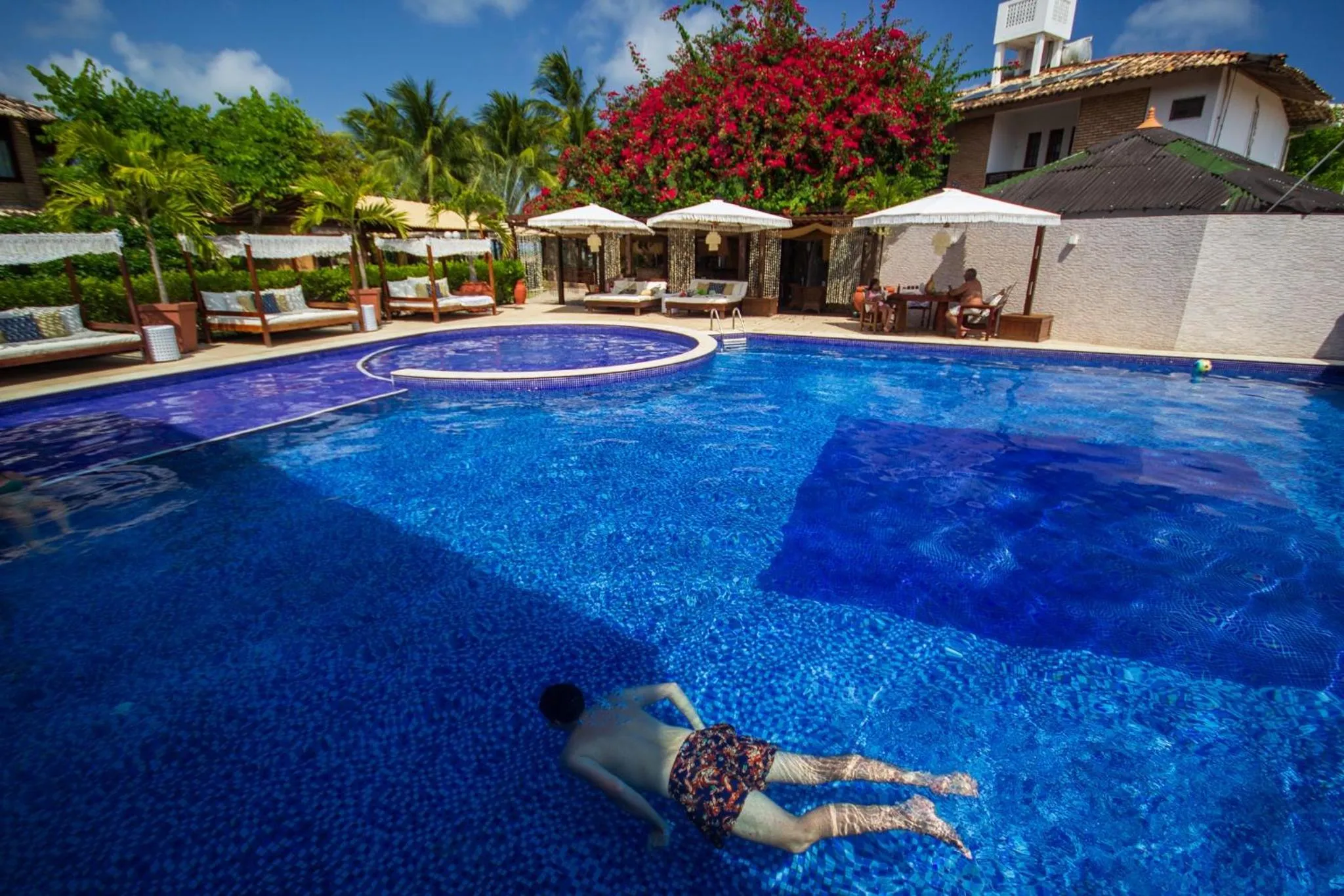 Swimming pool in Pousada Encontro das Águas
