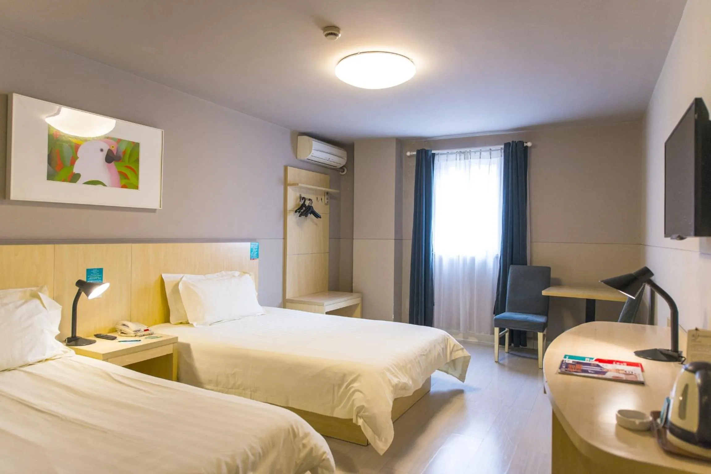 Bed in Jinjiang Inn Style Xinyang Dongfanghong Avenue Cultural Centre