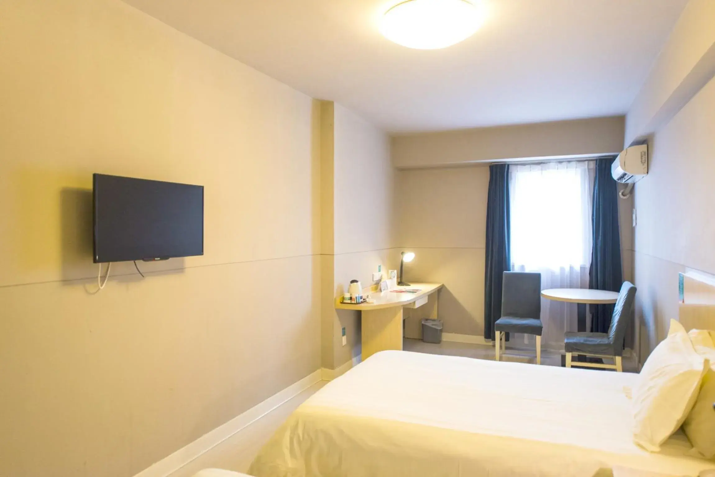 Bed in Jinjiang Inn Select Fanchang Darunfa Square Bed in Jinjiang Inn Select Fanchang Darunfa Square