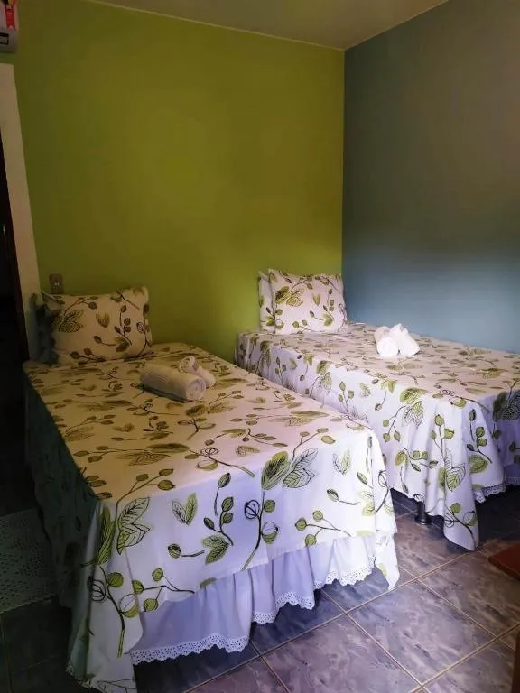 Bed in Pousada Nenzinha