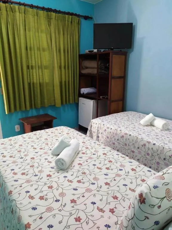 Bed in Pousada Nenzinha