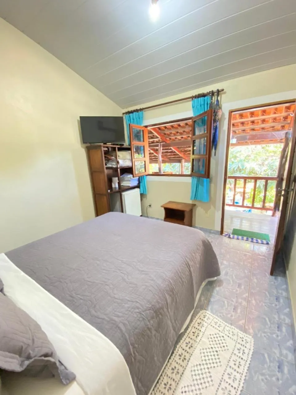 Bed in Pousada Nenzinha