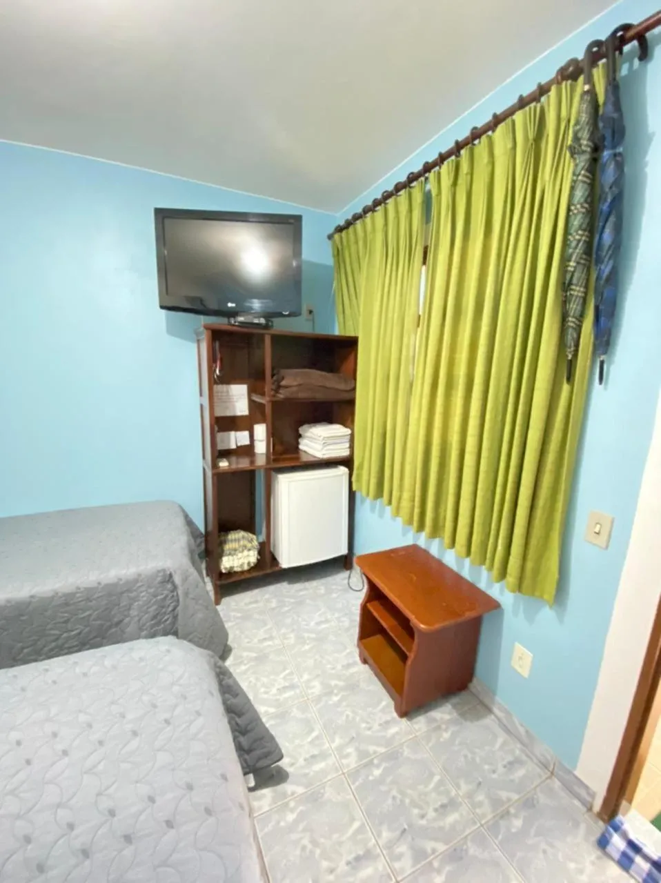 Bed in Pousada Nenzinha