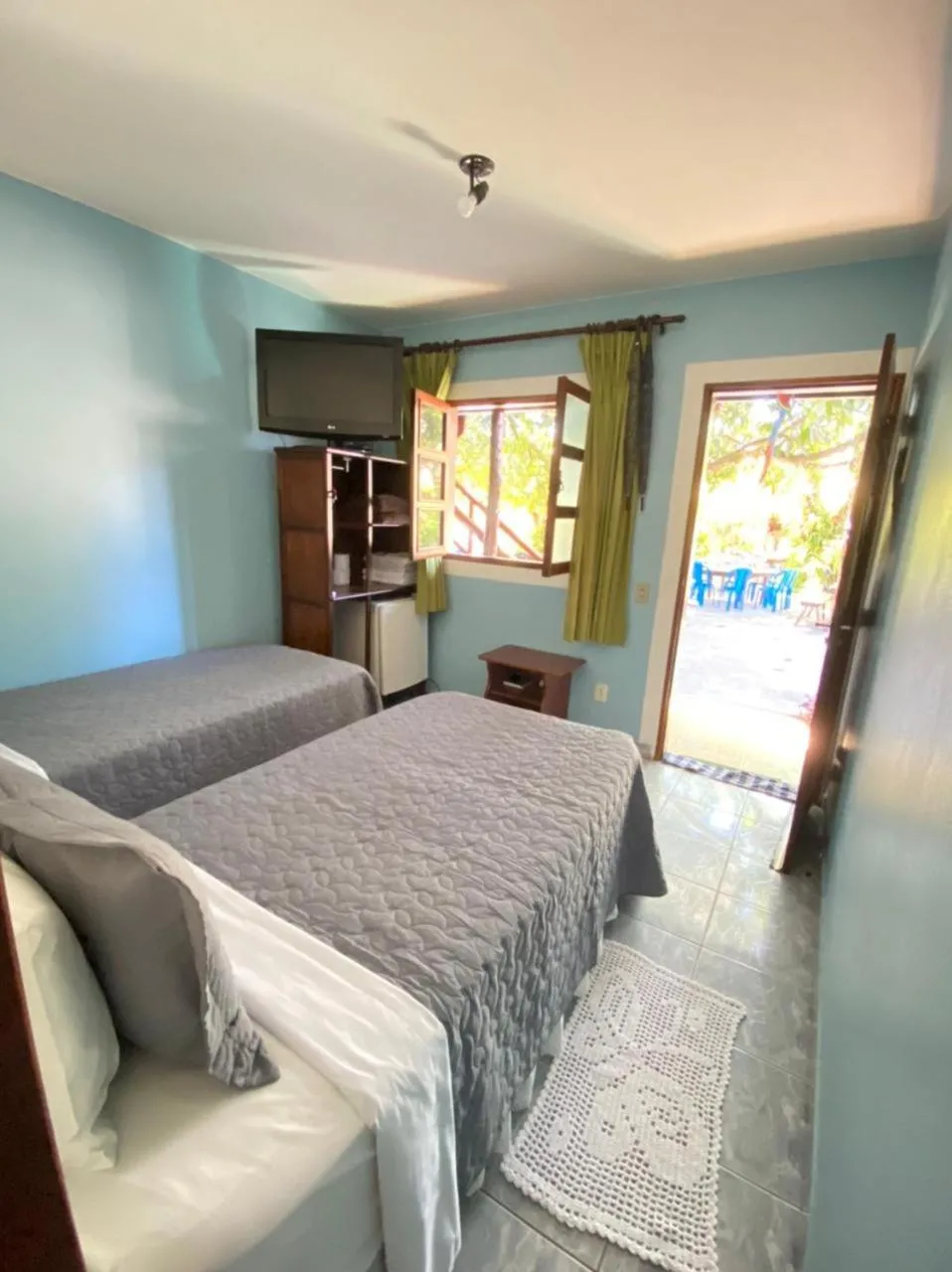 Bed in Pousada Nenzinha