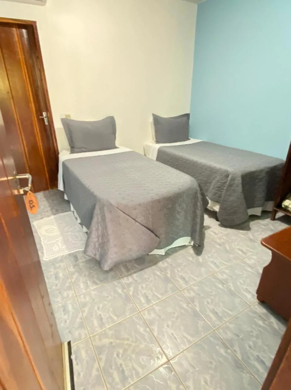 Bed in Pousada Nenzinha