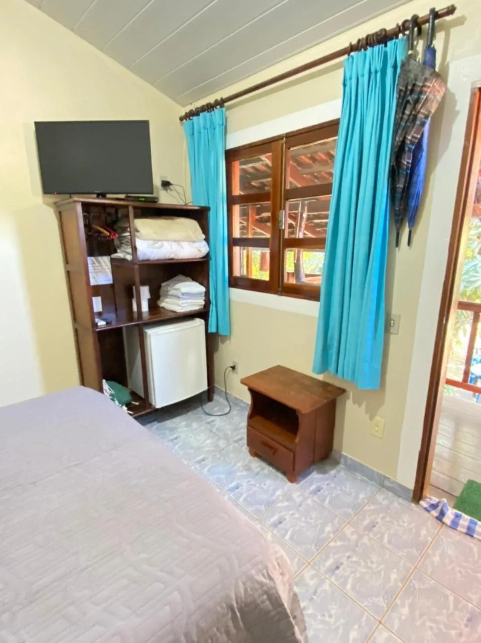 Bed in Pousada Nenzinha