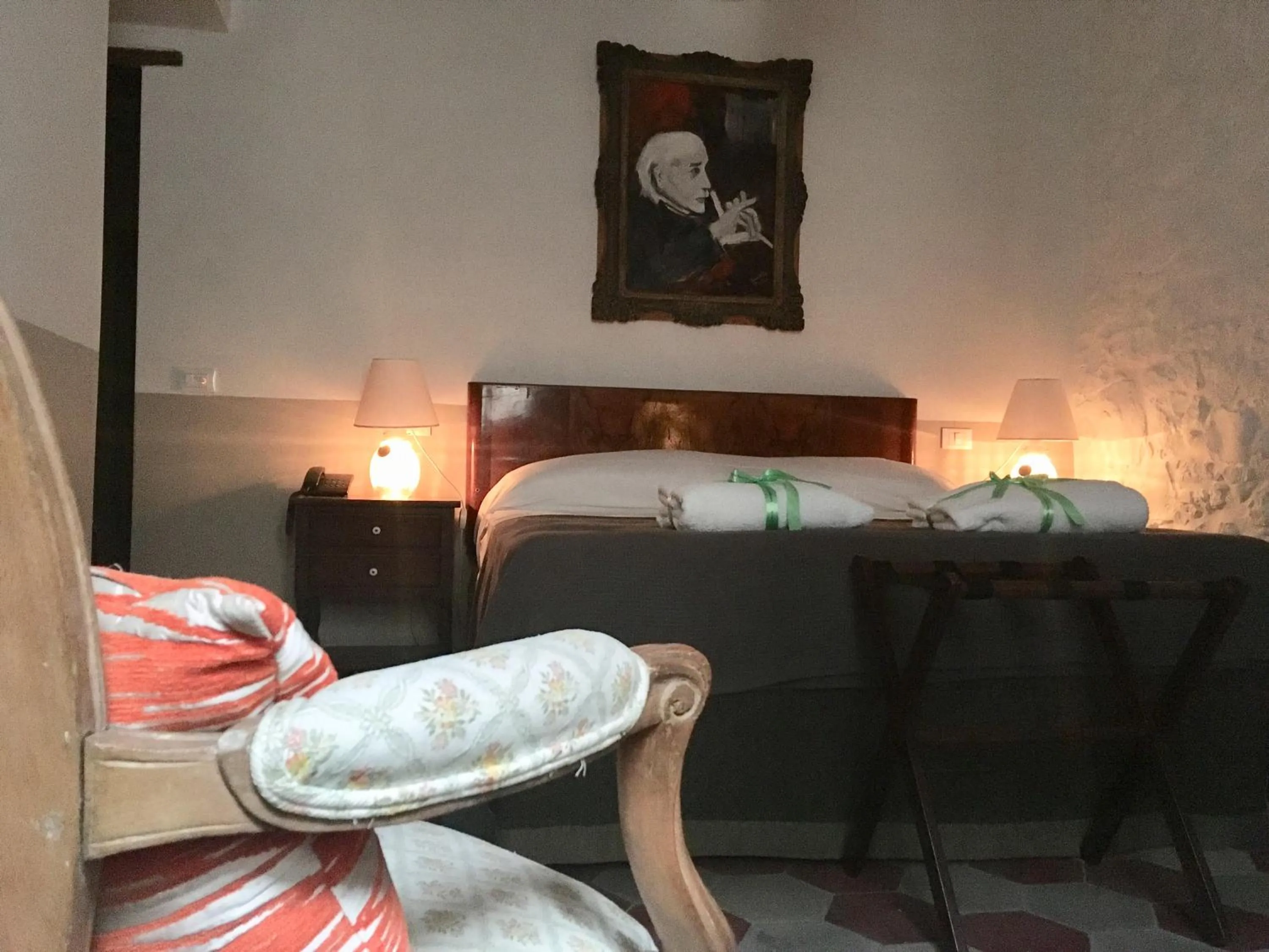 Decorative detail, Bed in B&B Locanda Toscanini