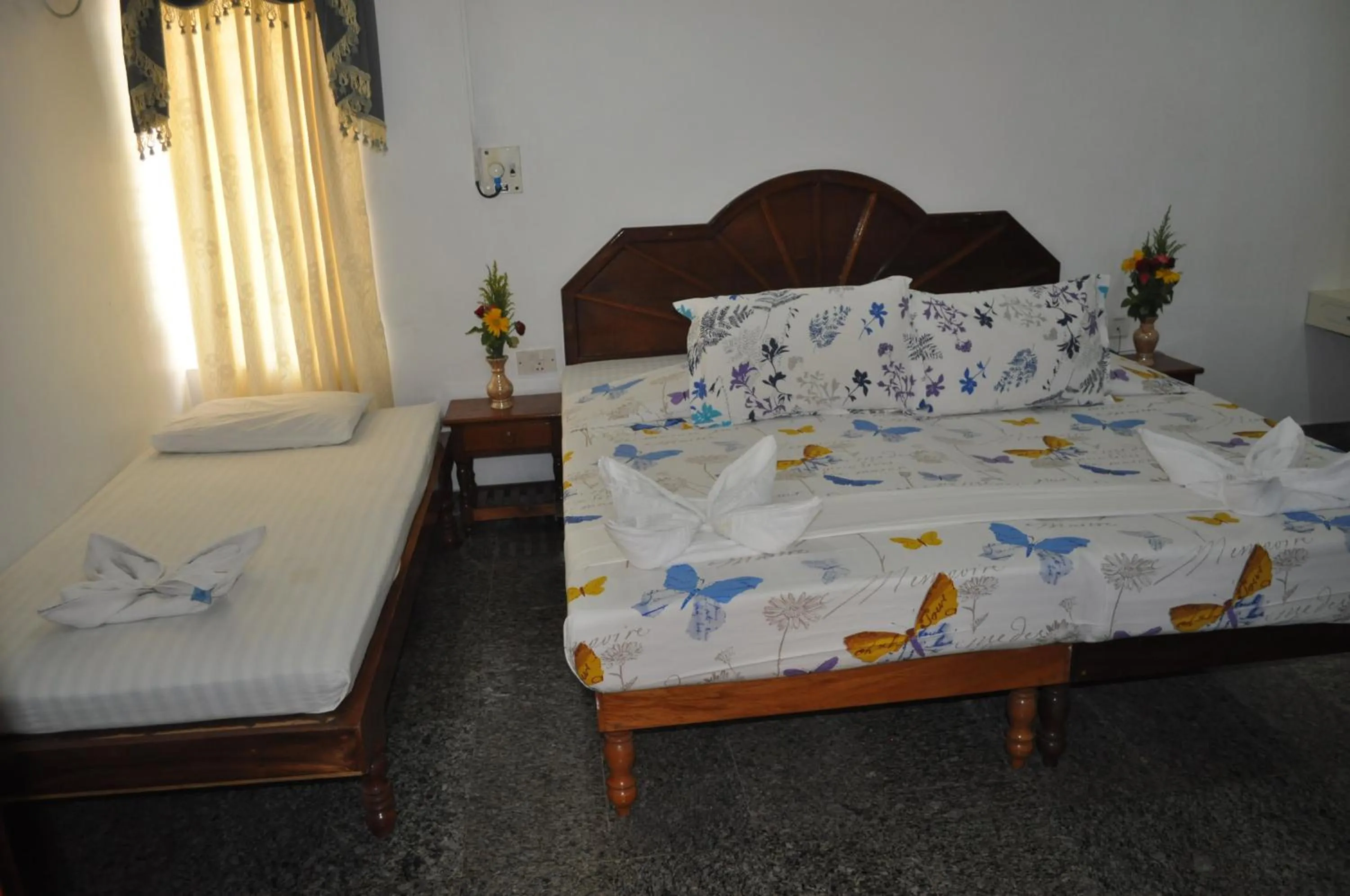 Bed in Marine Palace Beach Hotel