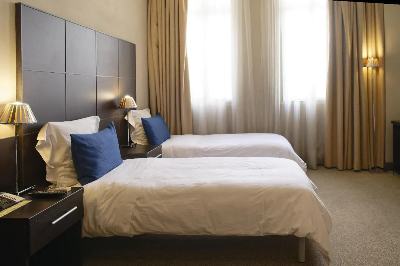 Bed in TANA-Boutique Hôtel