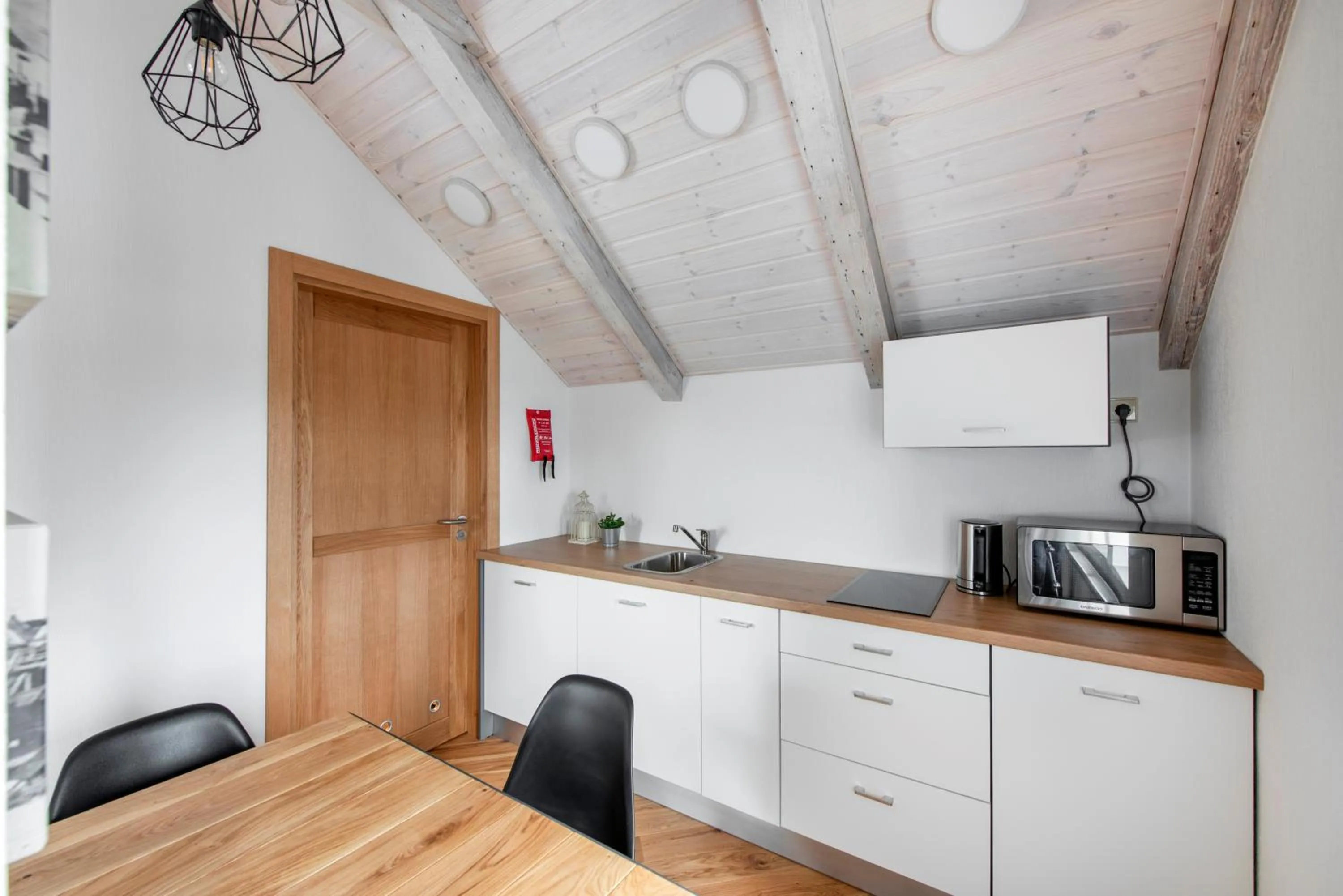 Kitchen or kitchenette in Piano Apartments