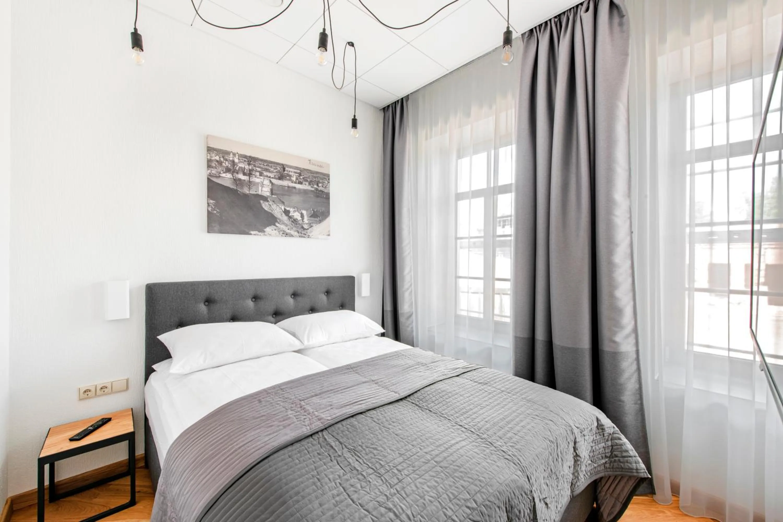 Bed in Piano Apartments