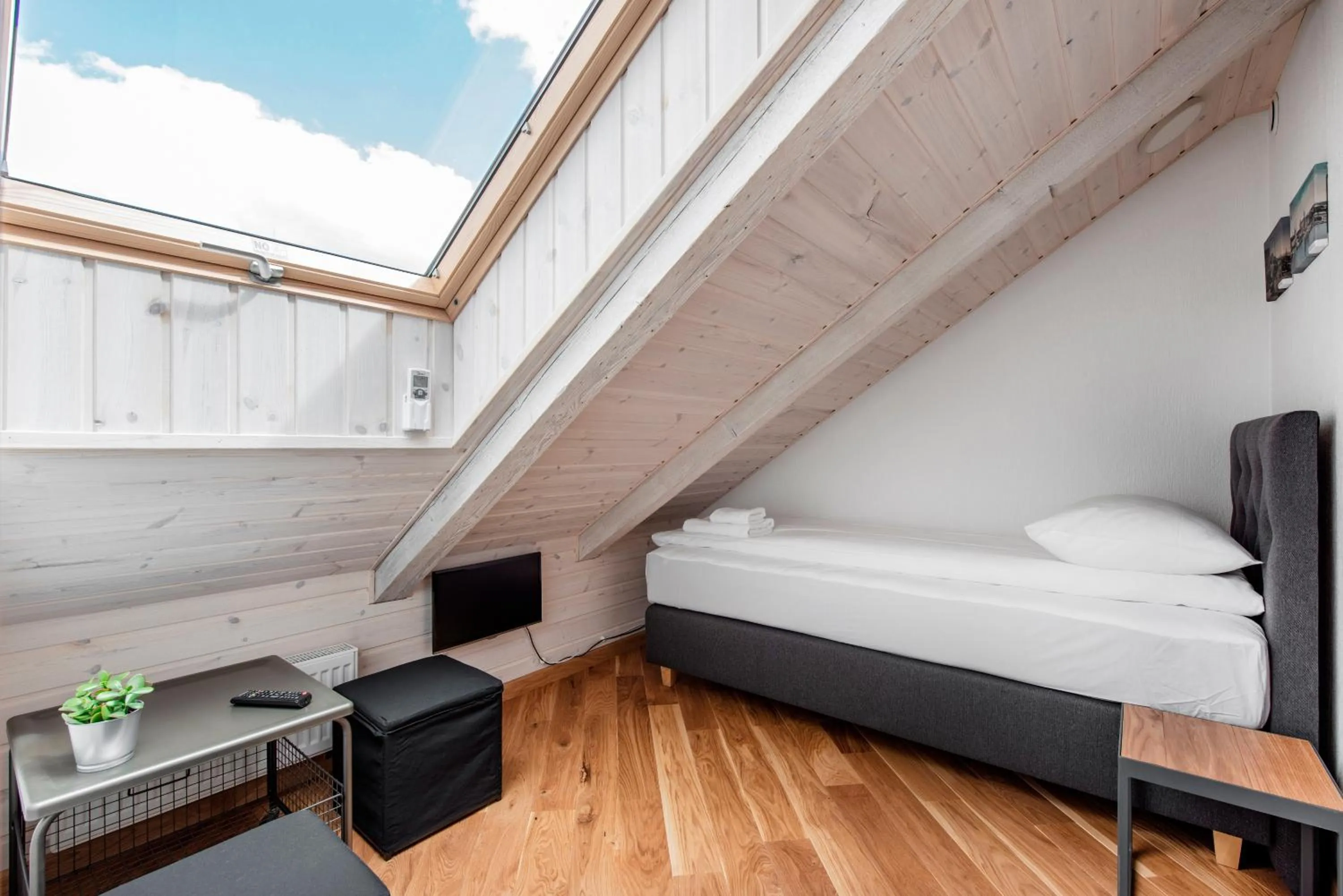 Bed in Piano Apartments