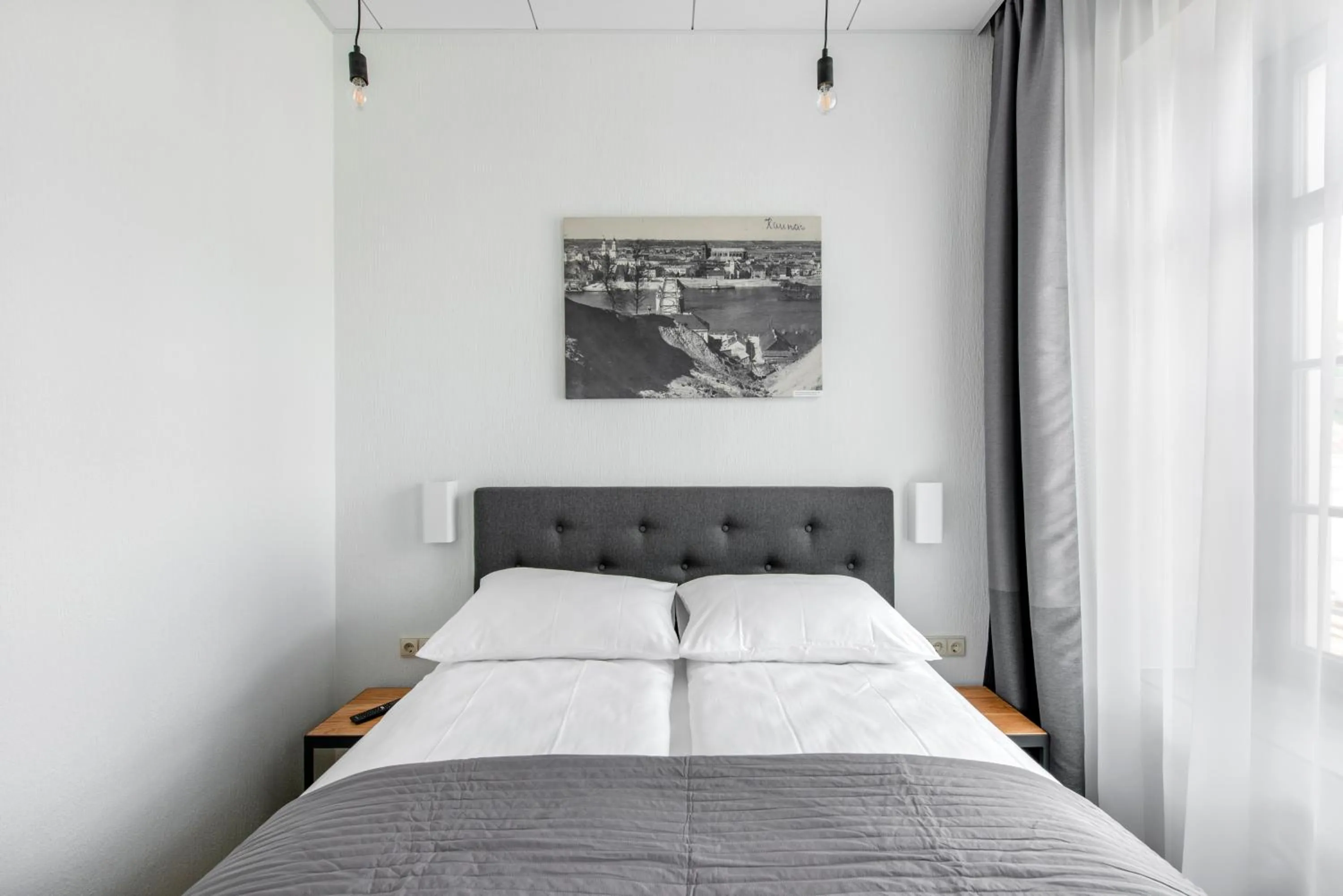 Bed in Piano Apartments