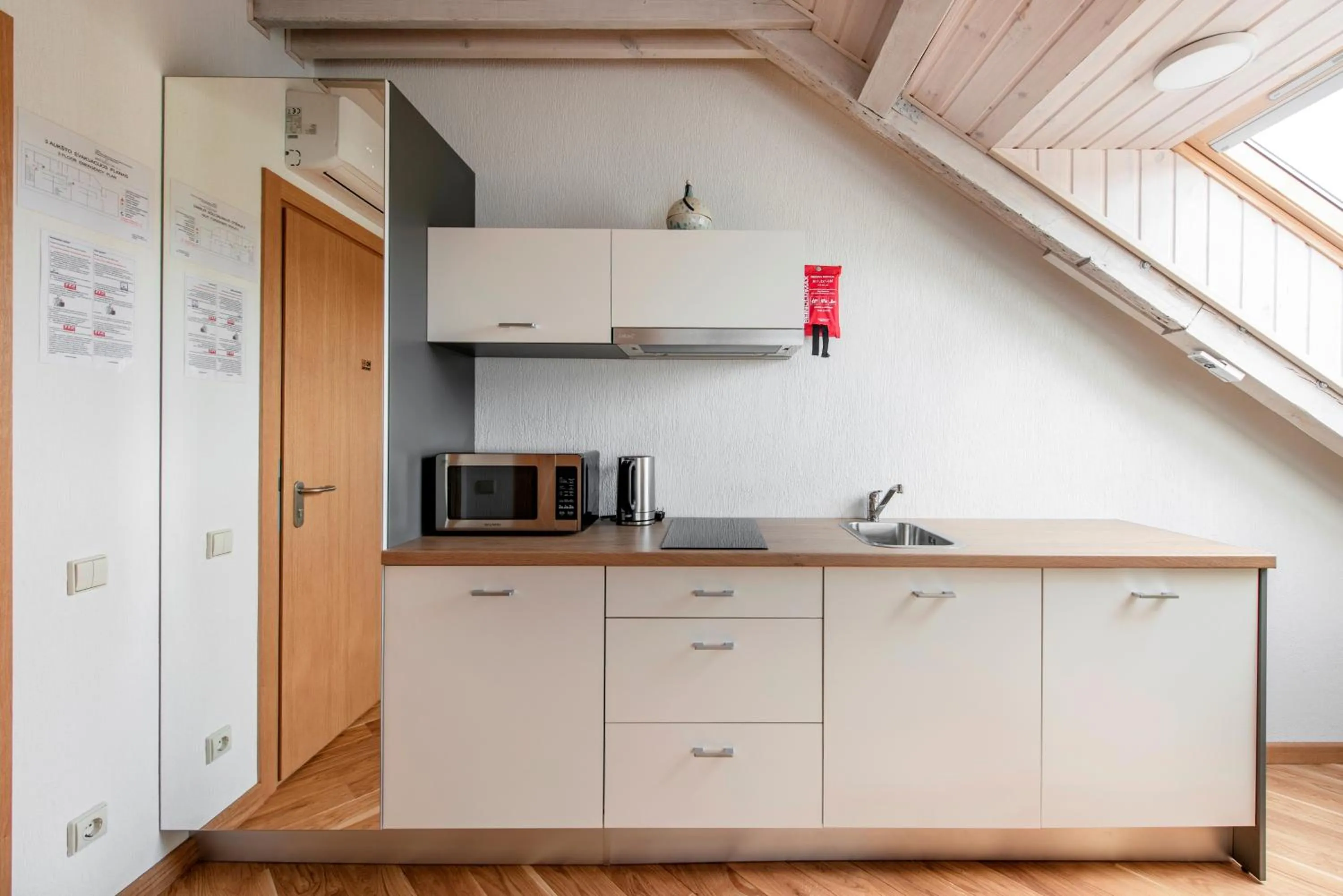 Kitchen or kitchenette in Piano Apartments