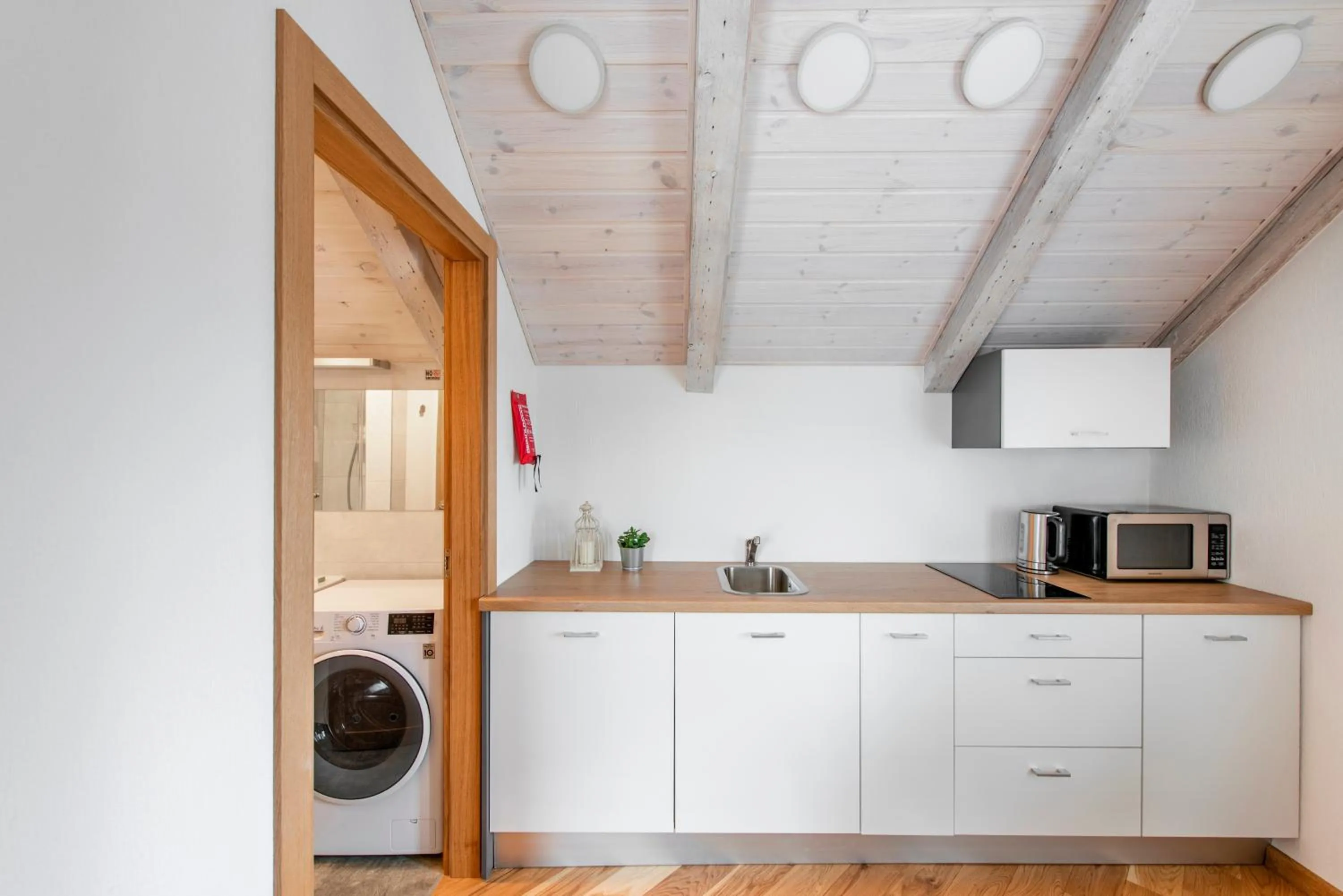 Kitchen or kitchenette in Piano Apartments