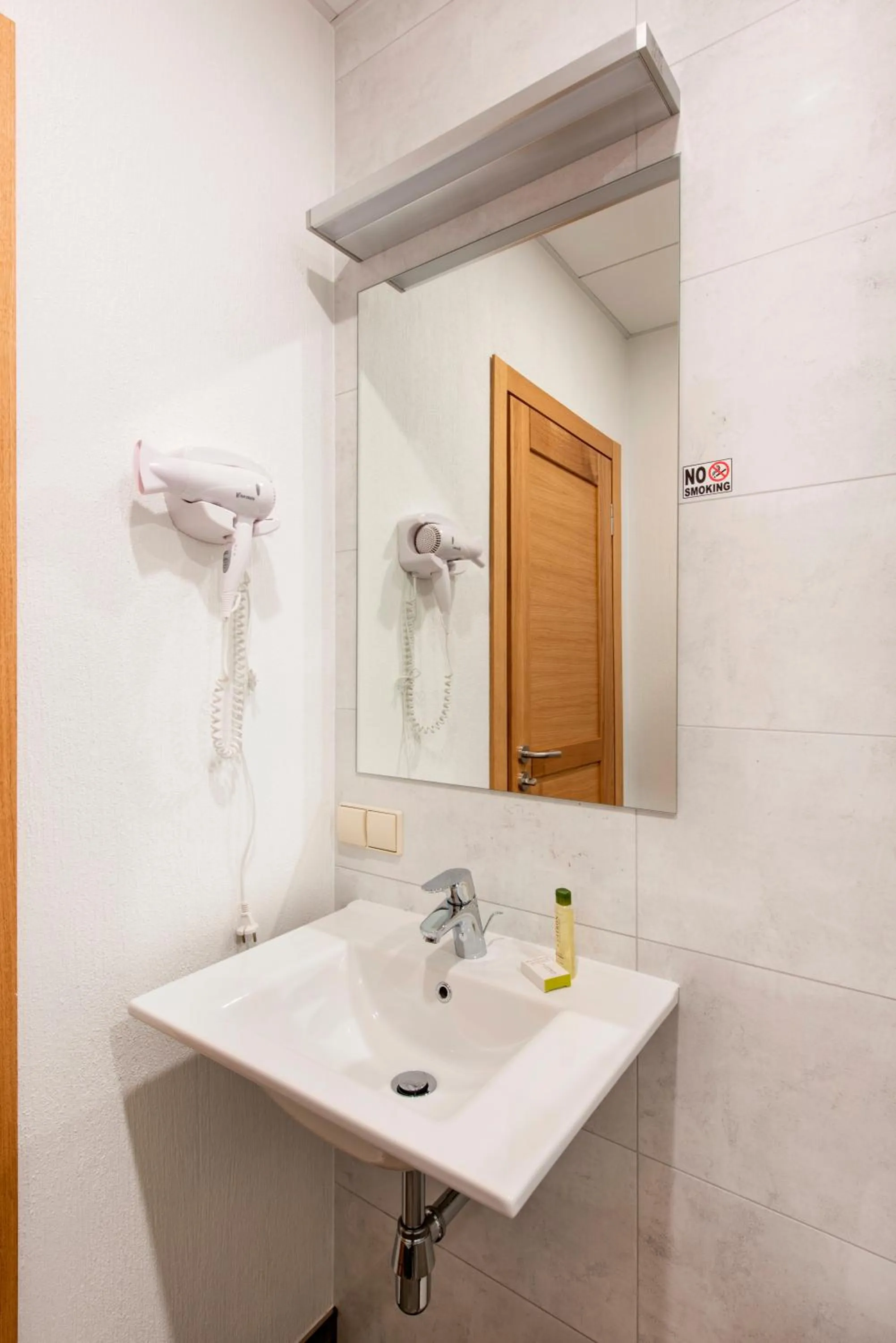 Bathroom in Piano Apartments