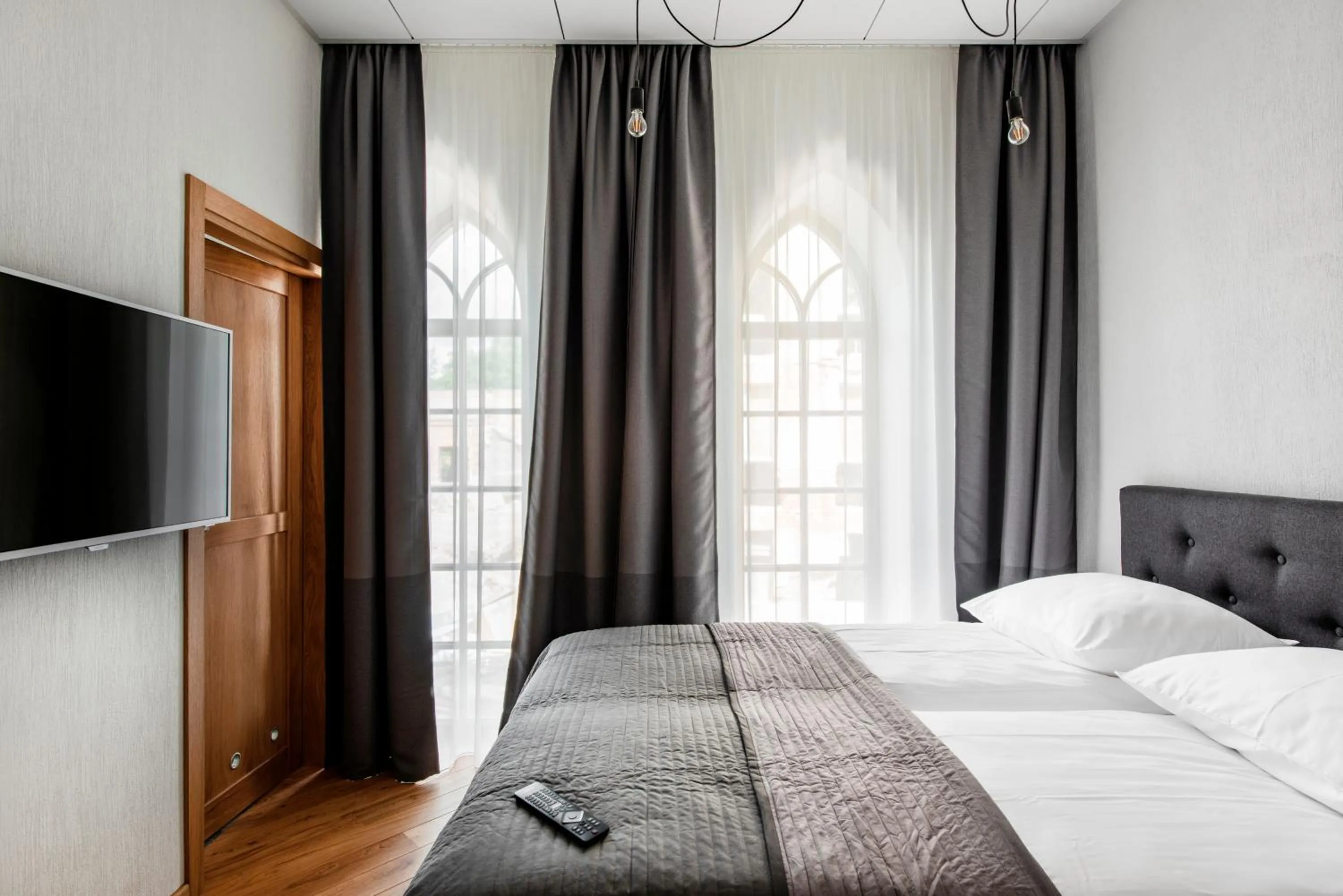 Bed in Piano Apartments