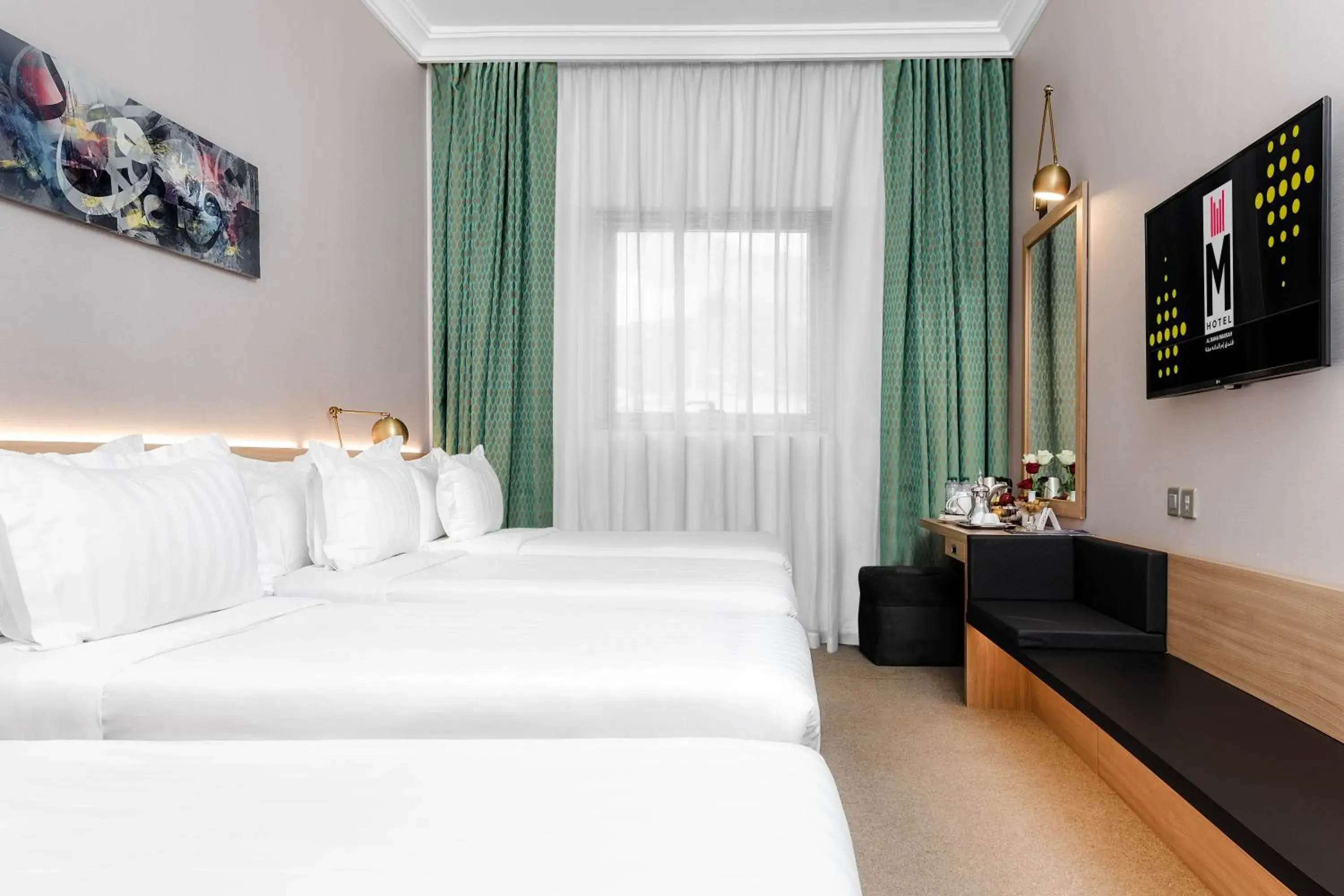 Bed in M Hotel Al Dana Makkah by Millennium Bed in M Hotel Al Dana Makkah by Millennium